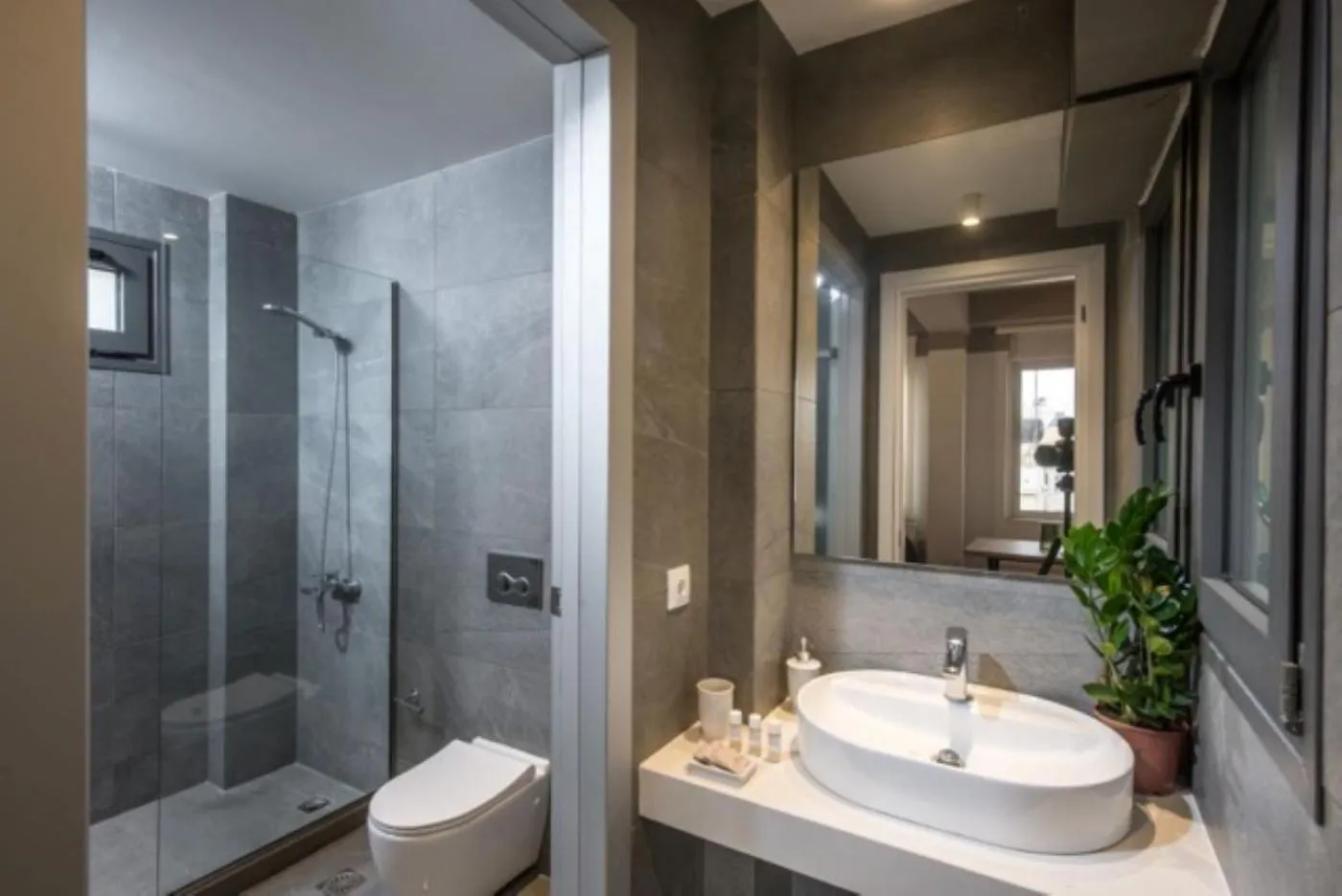Shower in Centro Vero Suites by Omilos Hotels