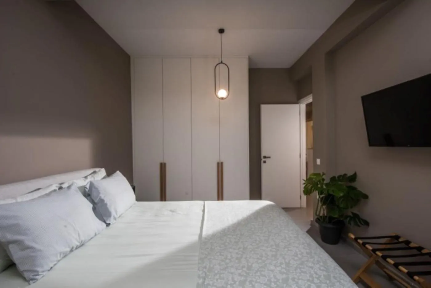 Bed in Centro Vero Suites by Omilos Hotels