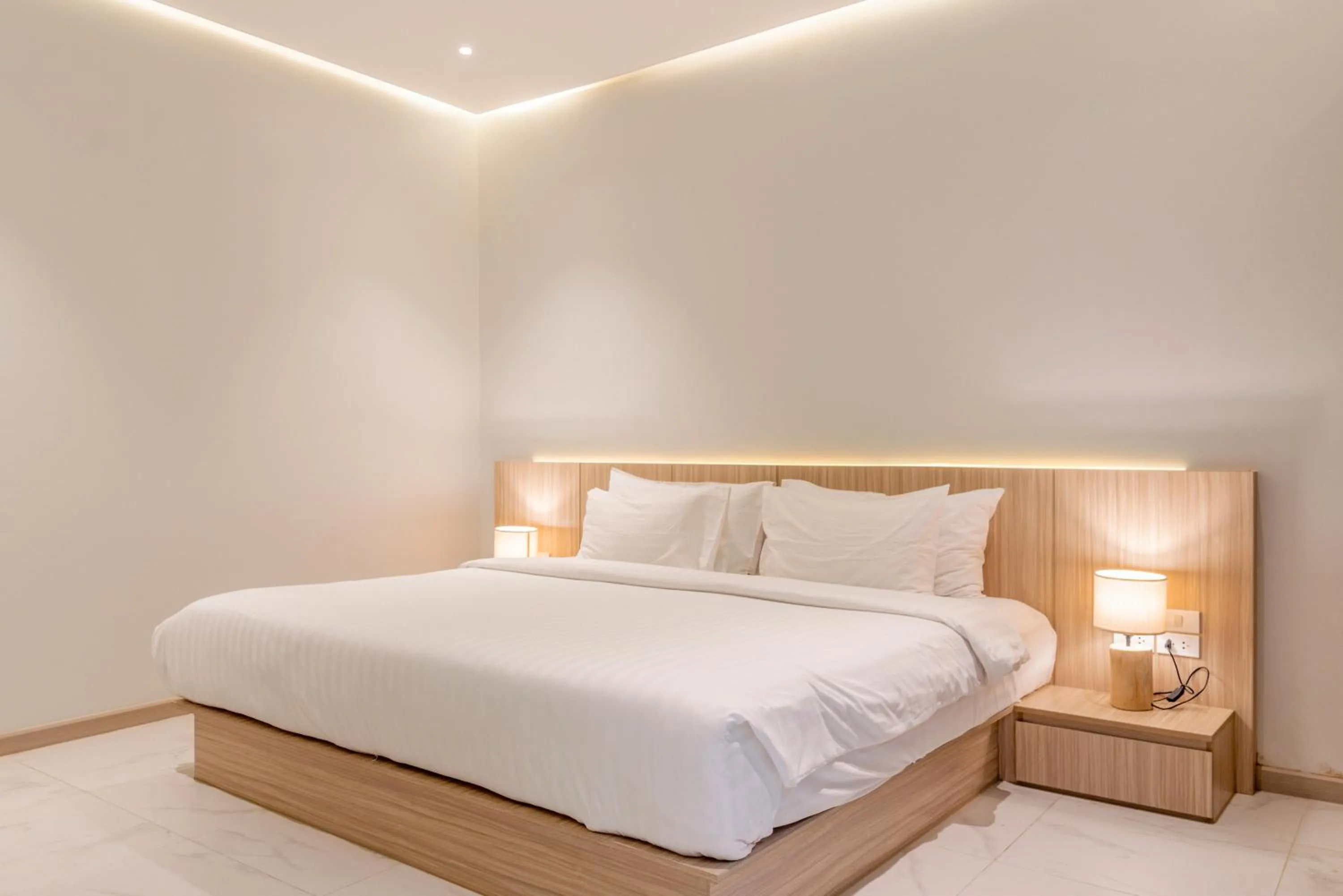 Bed in Replay Pool Villa