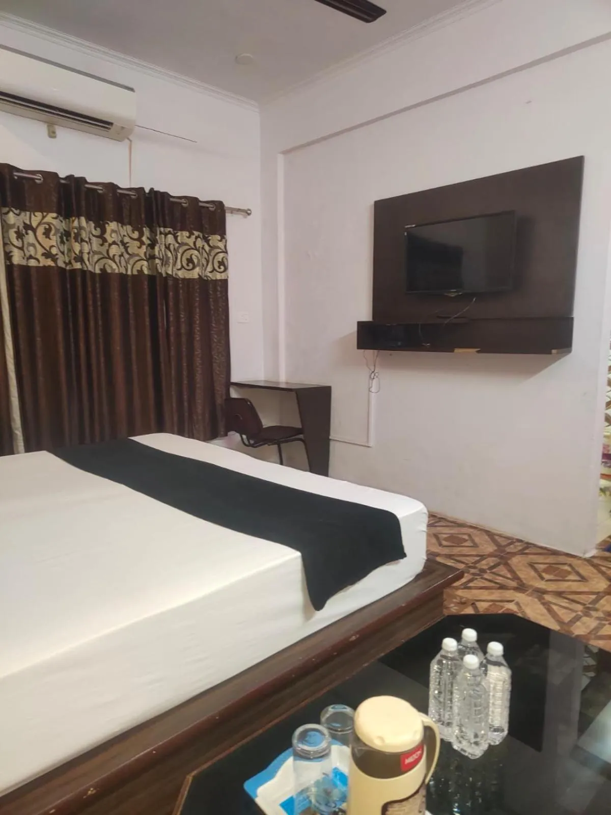 Bed in Mansarover Hotel & Banquets
