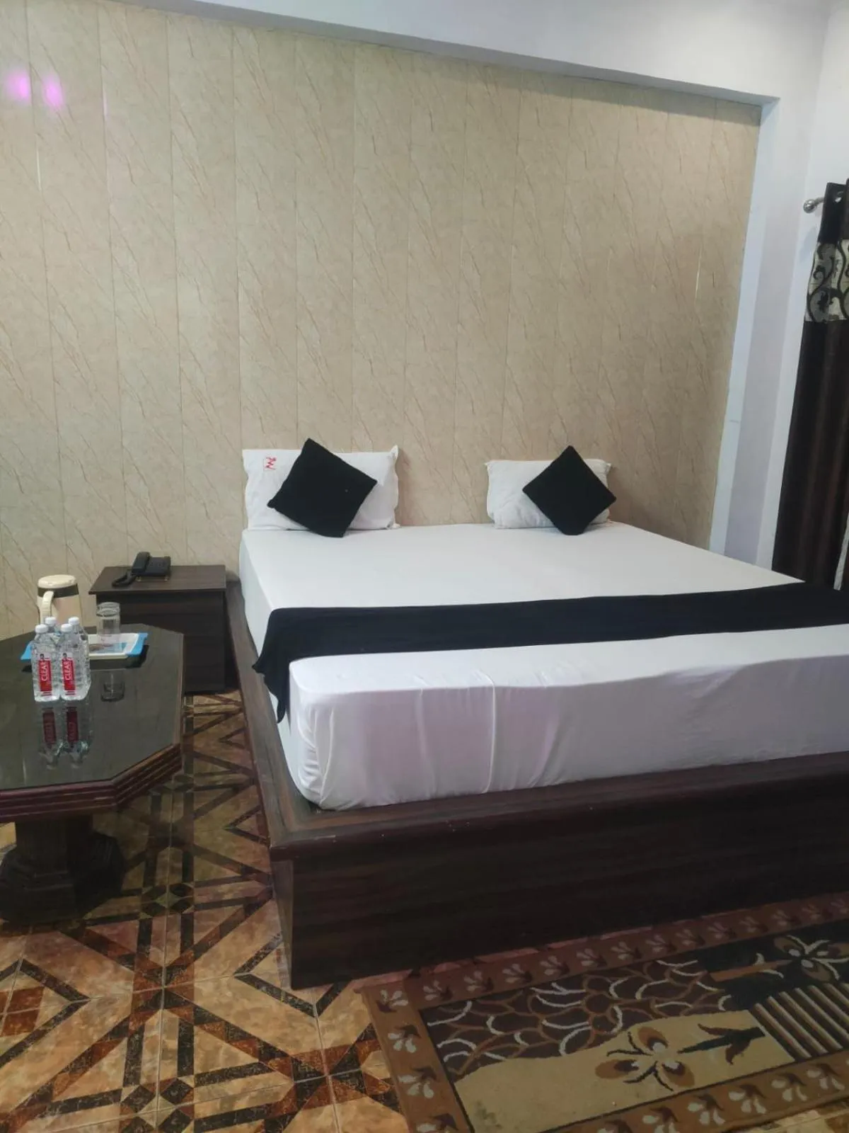 Bed in Mansarover Hotel & Banquets