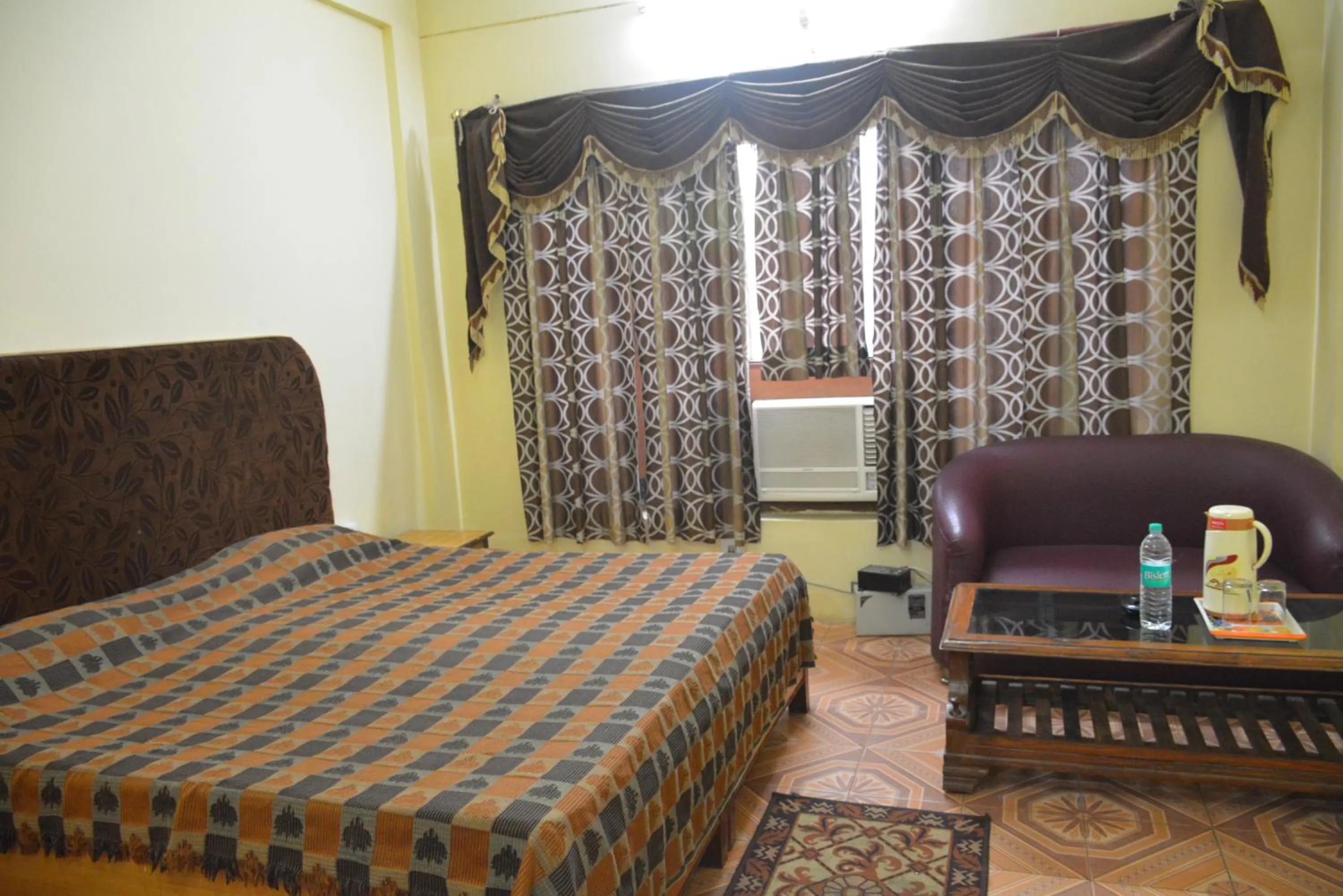 Bed in Mansarover Hotel & Banquets