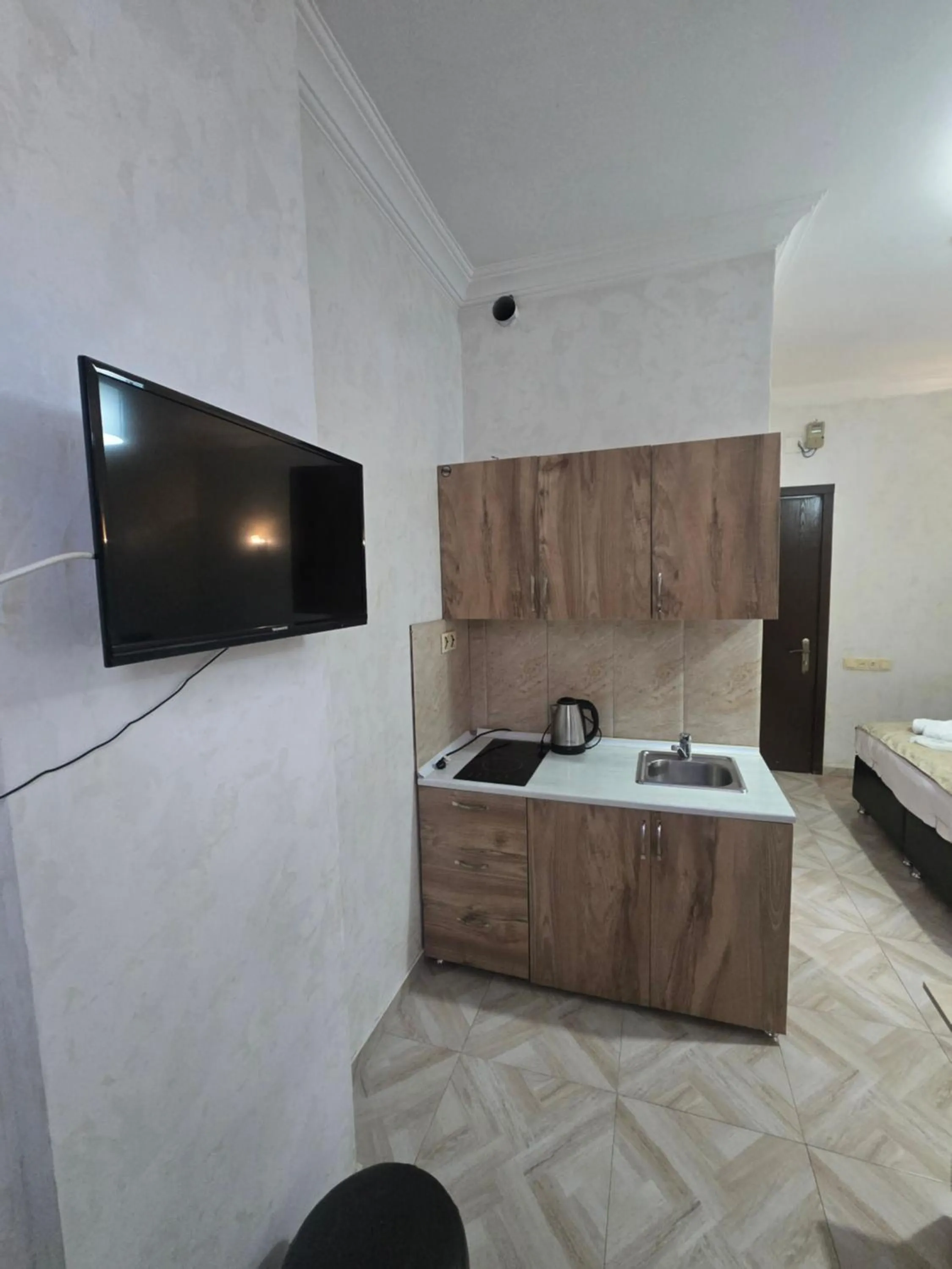 Communal lounge/ TV room in Batumi Inn Hotel