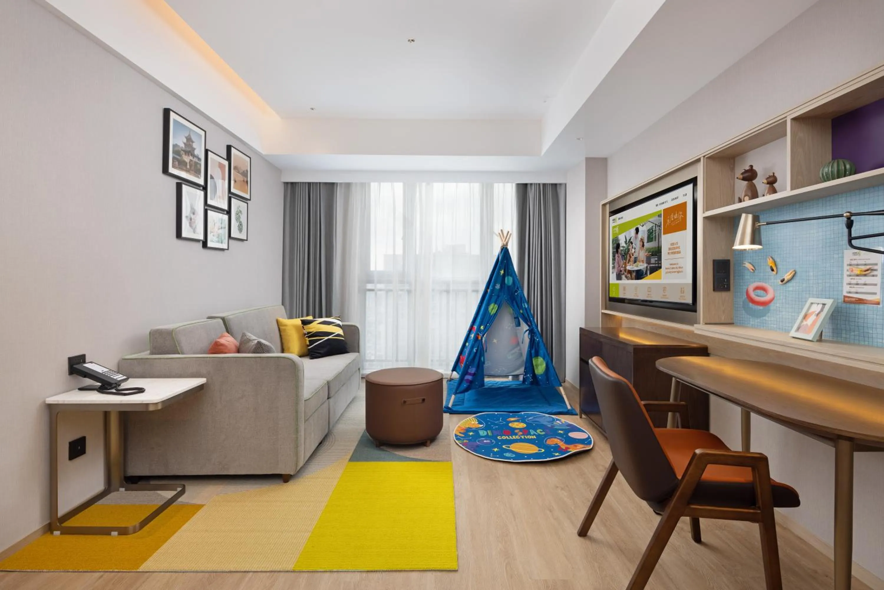 Living room in Home2 Suite by Hilton Guiyang Nanming Jiaxiu