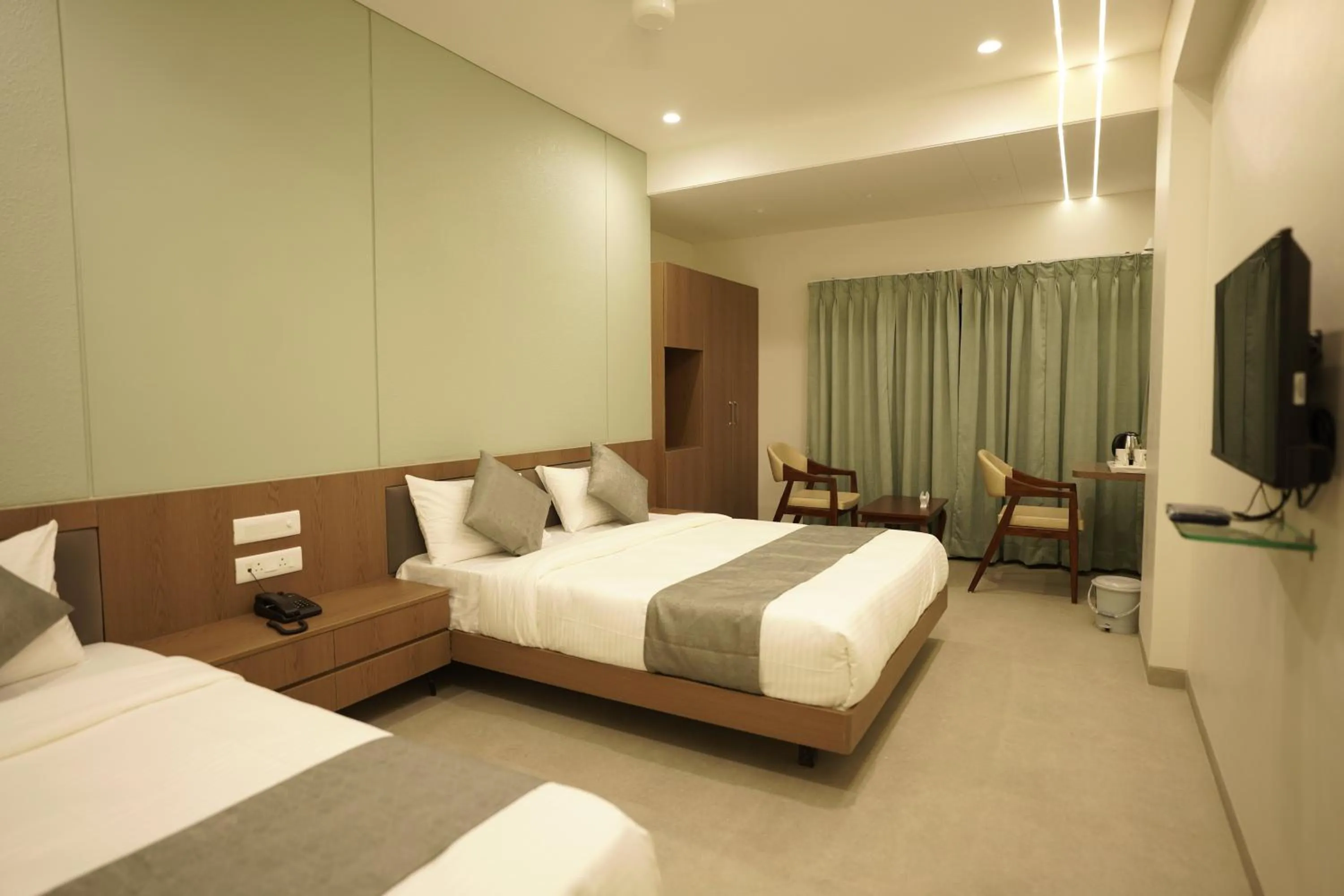 Bed in A Square Executive Hotel