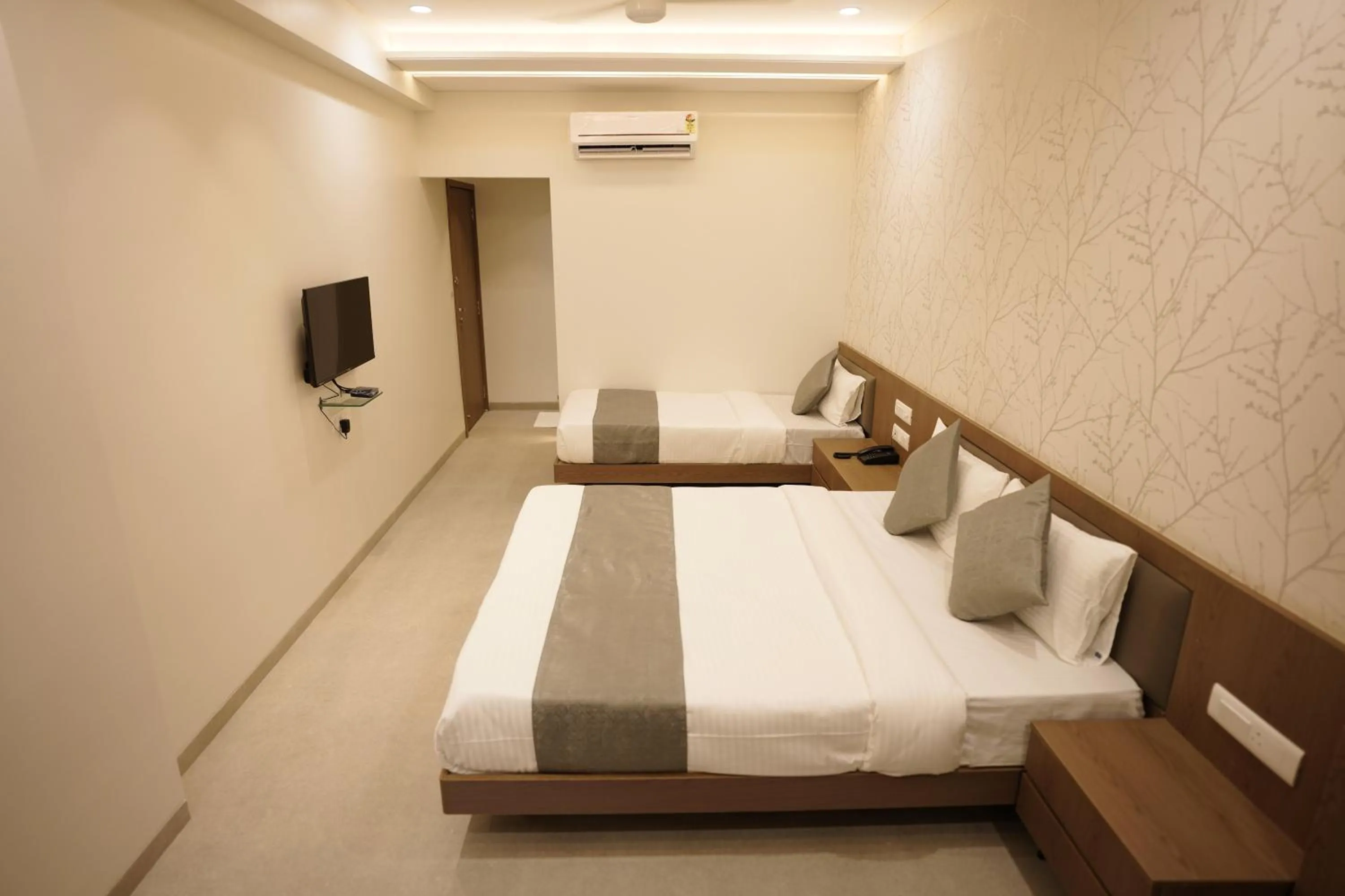 Bed in A Square Executive Hotel