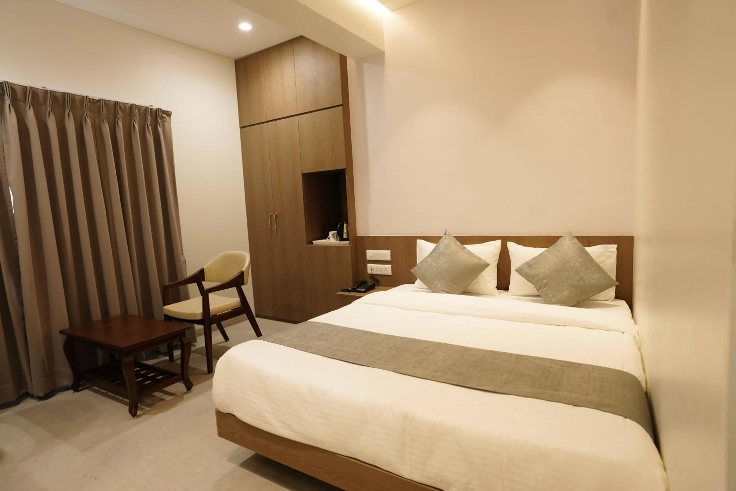 Bed in A Square Executive Hotel