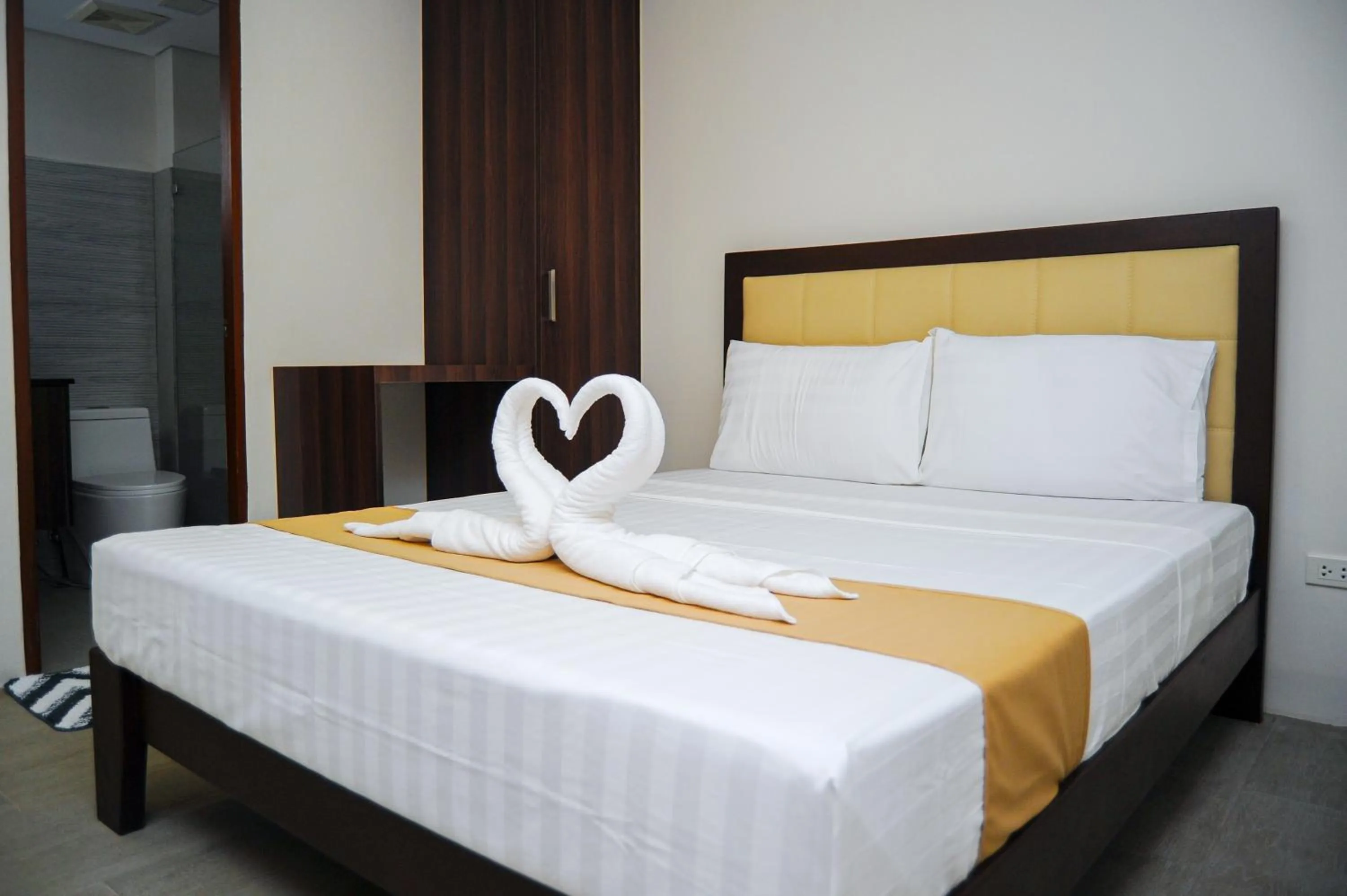 Bed in Kaia Isabelle Hotel Puerto Princesa