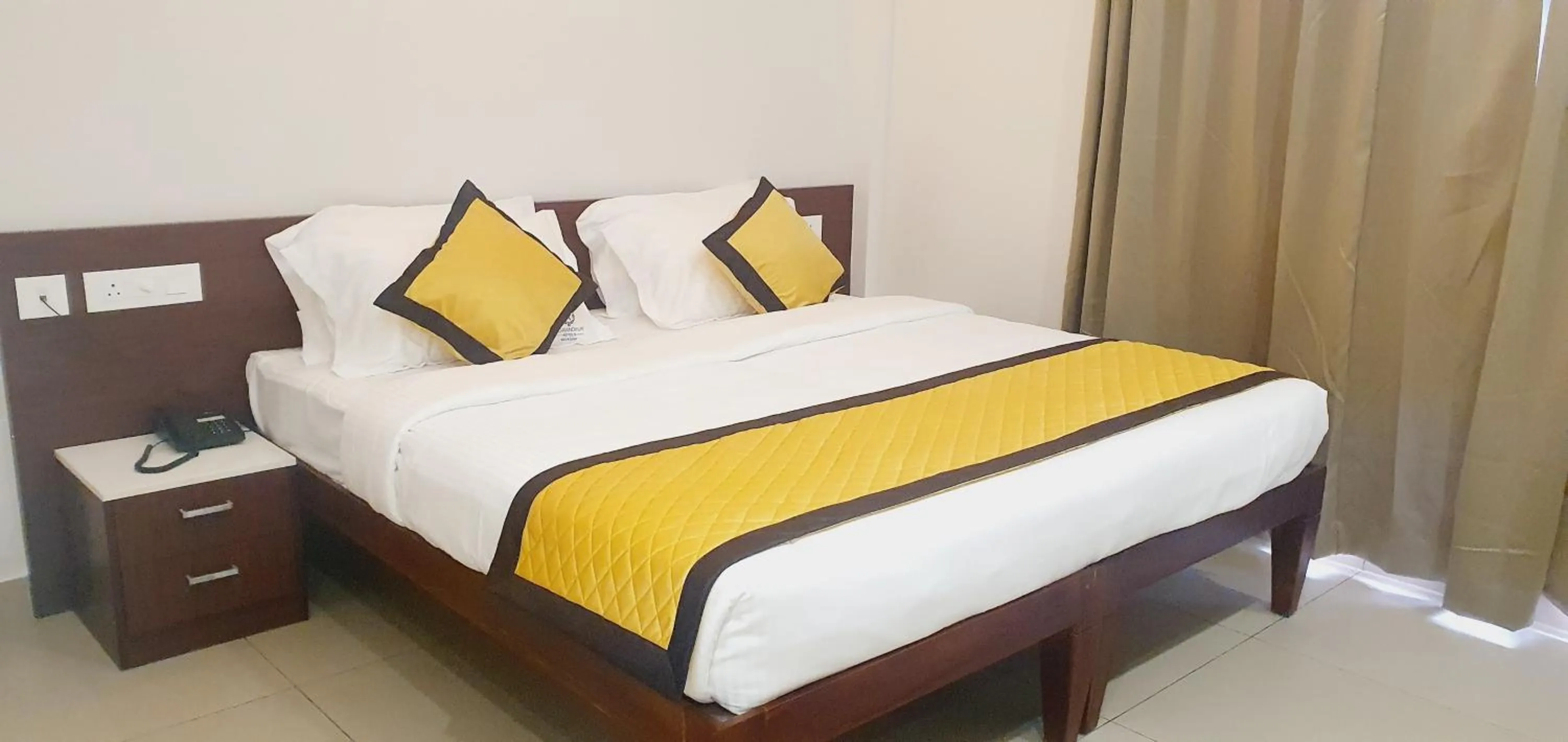 Bed in K Grandeur Hotels