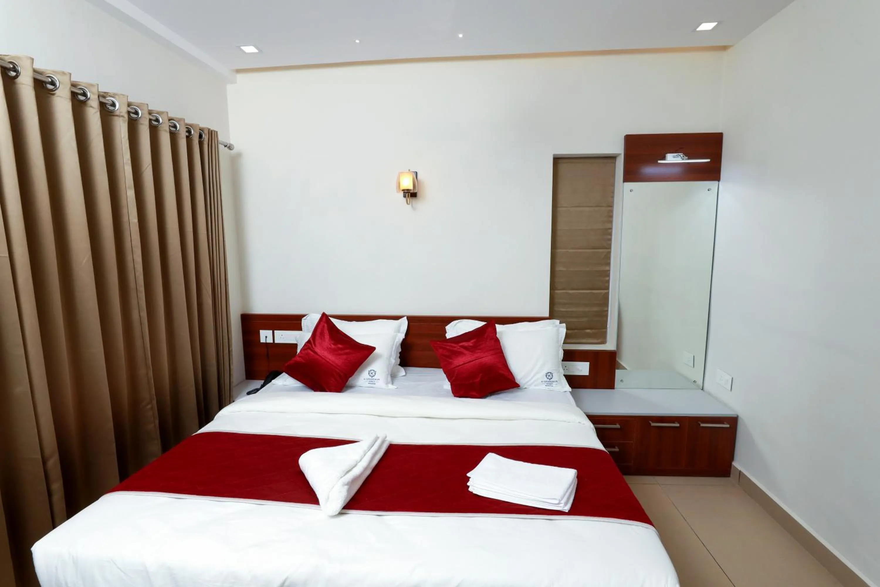 Photo of the whole room, Bed in K Grandeur Hotels