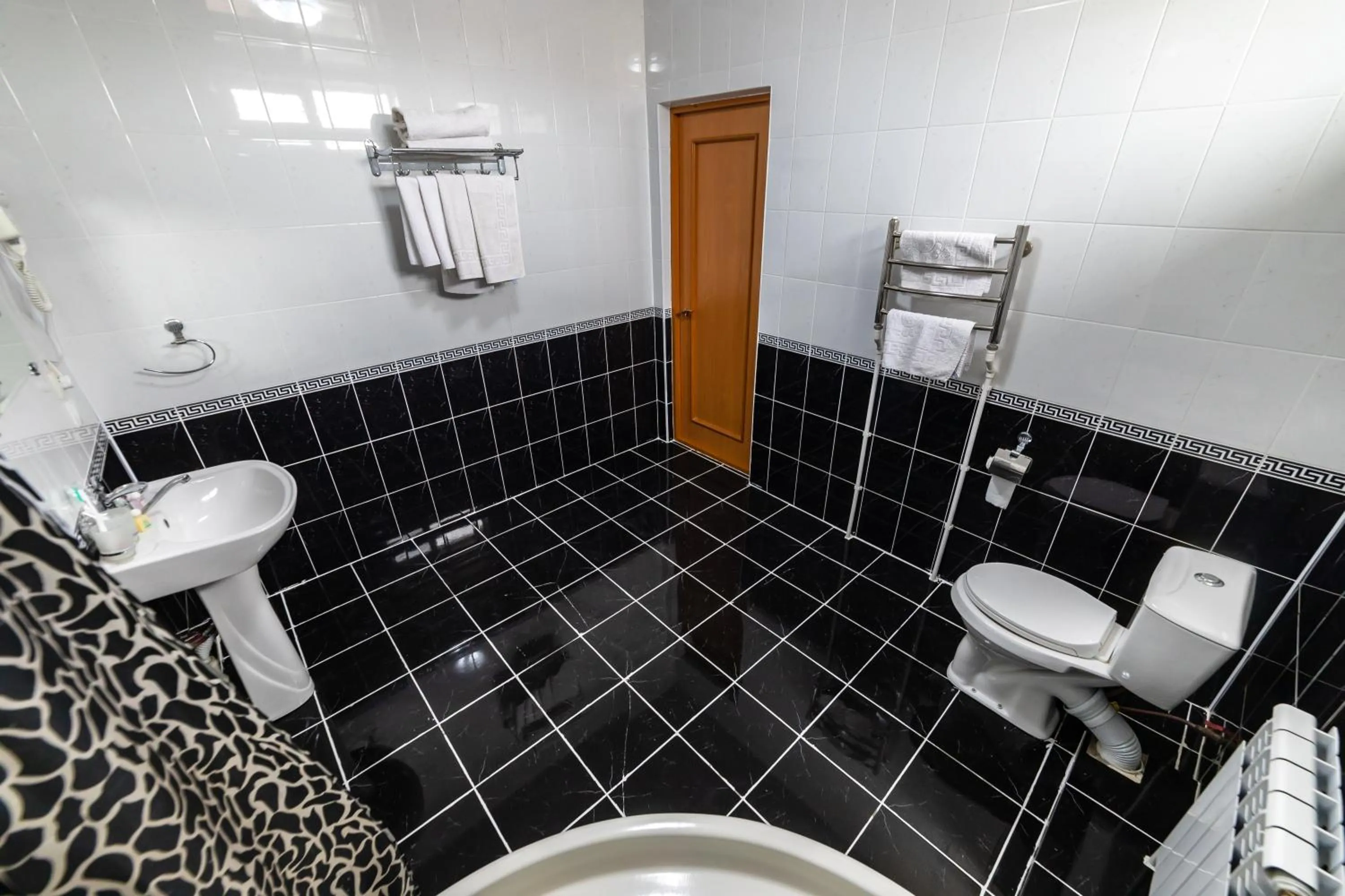 Shower in Qibla Tozabog