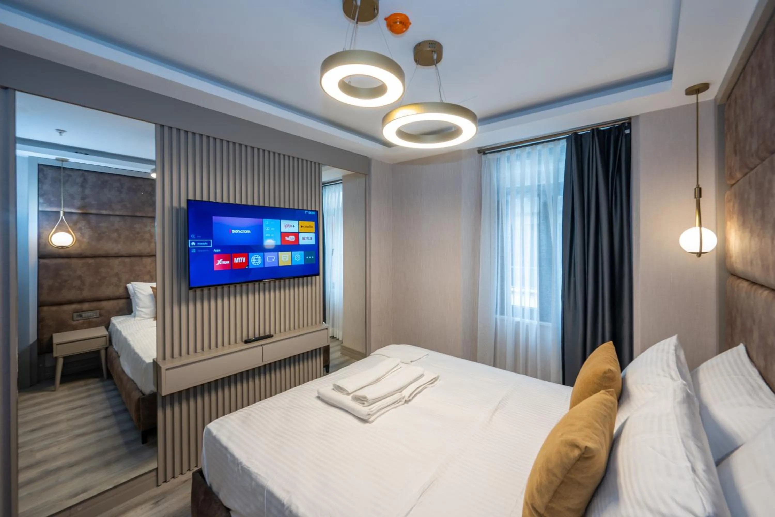 TV and multimedia, Bed in Massimo Hotel