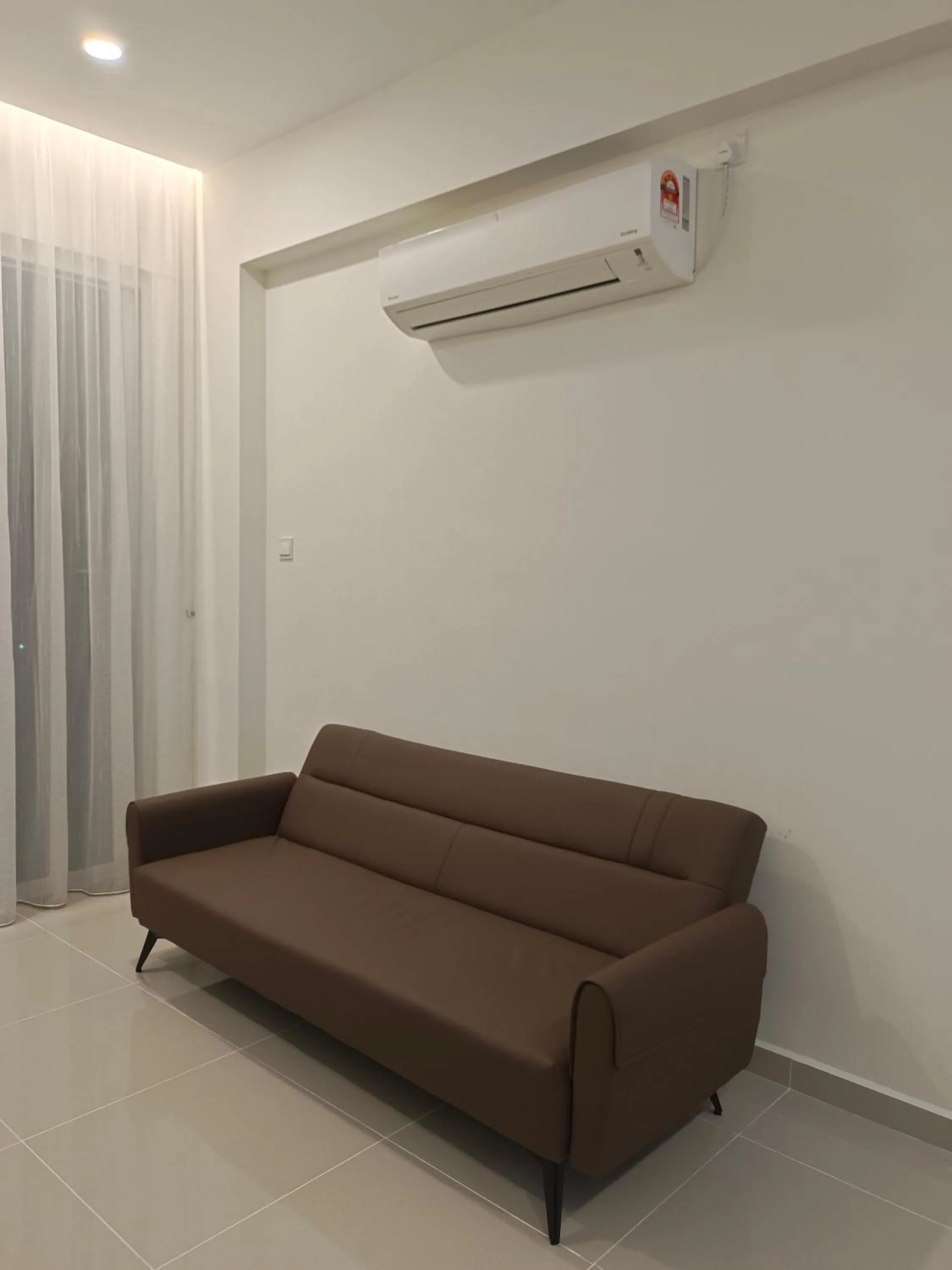 Living room in Sri Indah Pool Condostay