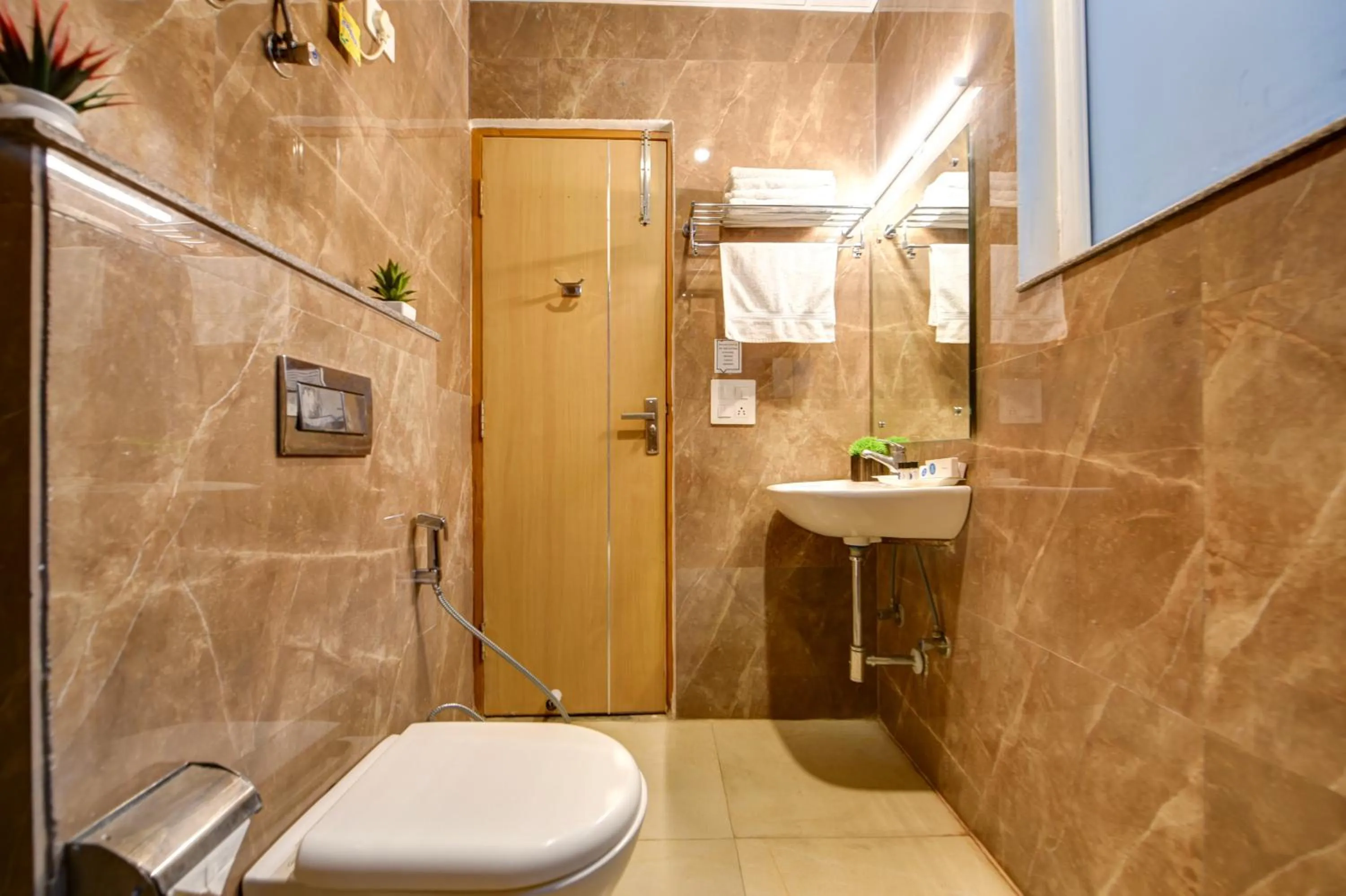 Bathroom in Aamantran Residency Hotel, Sohna Road, Sector 49, Gurugram