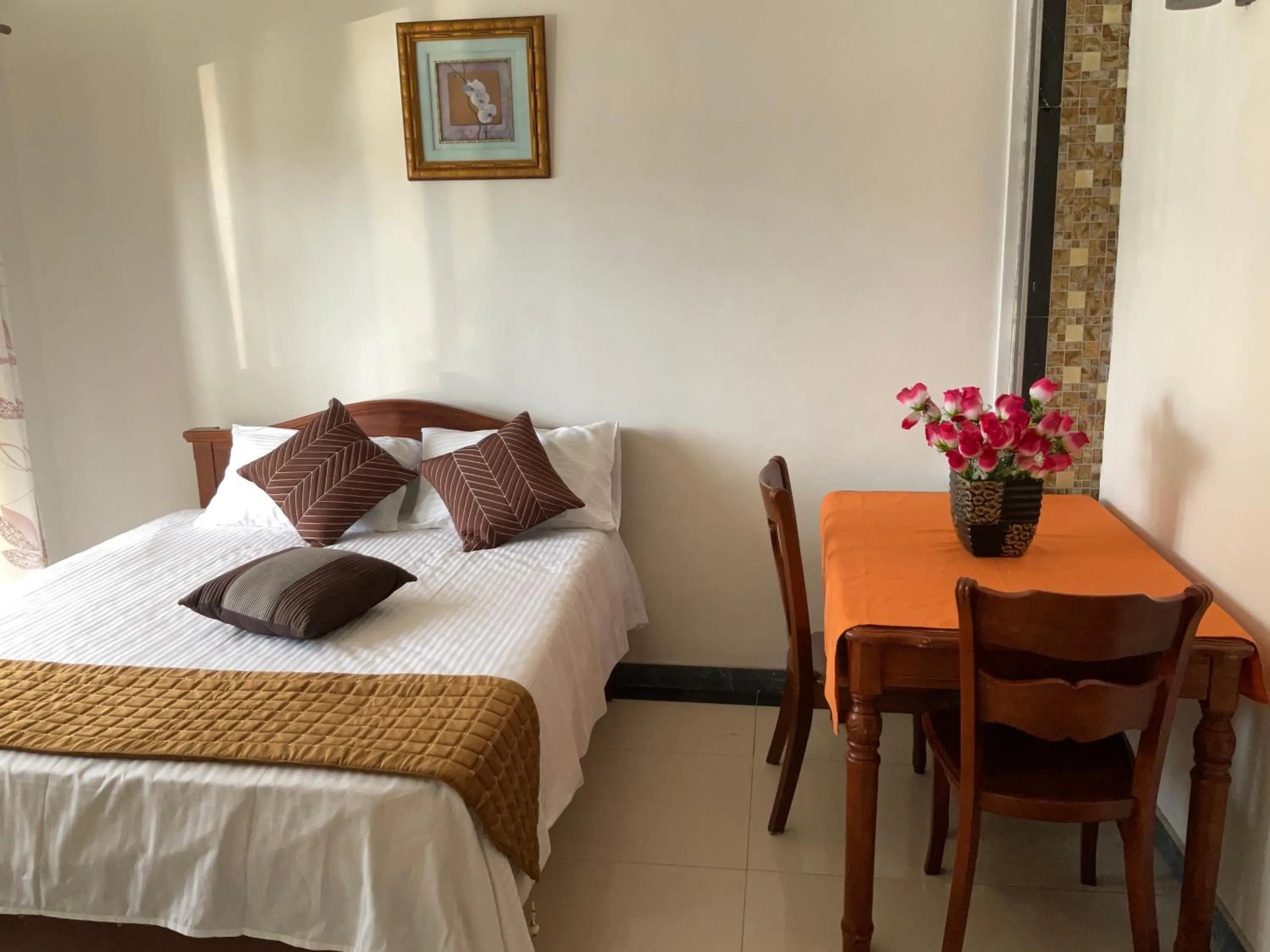 Photo of the whole room, Bed in Mahe Holiday Resort