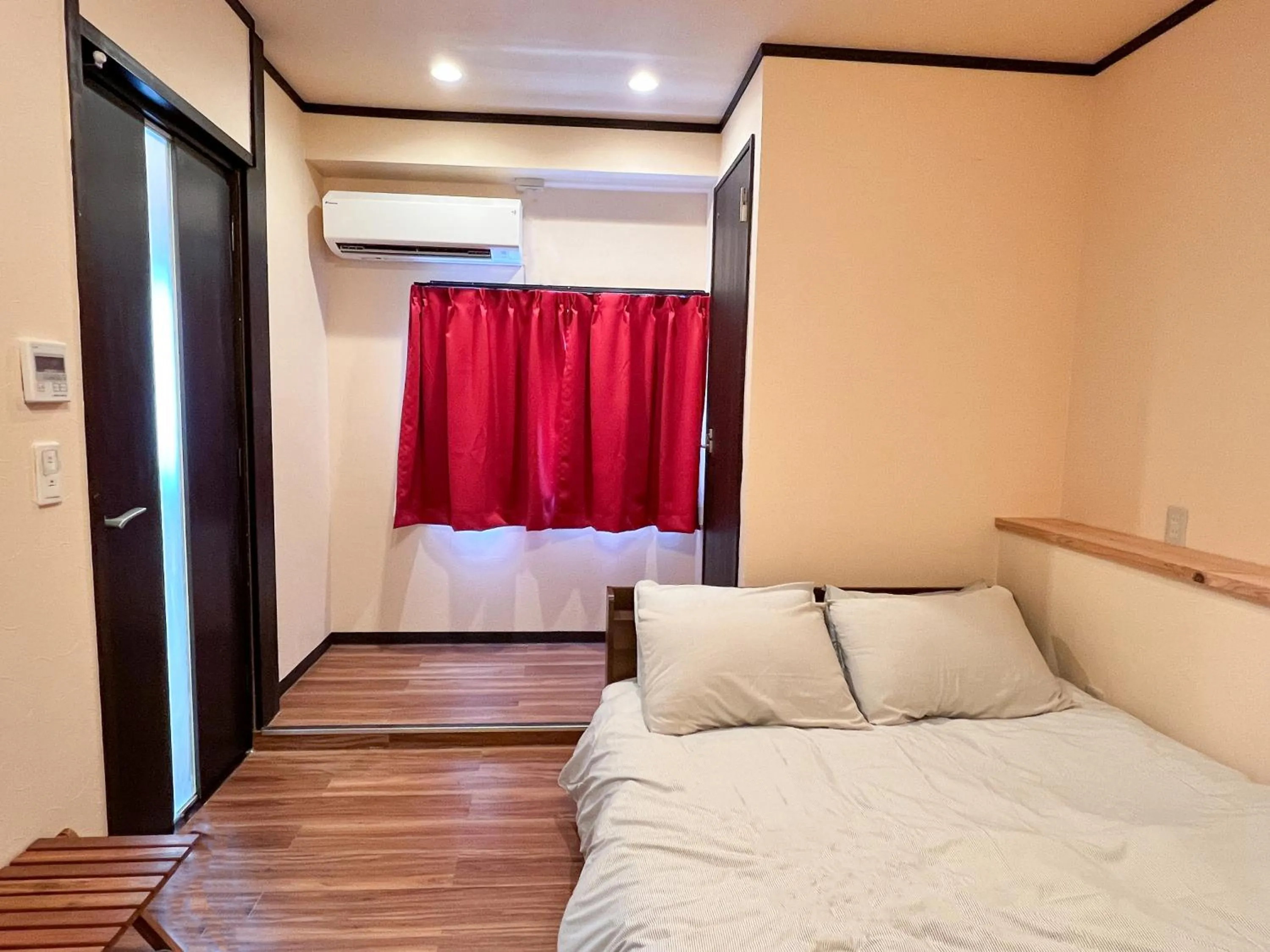 Bed in Jinya Sunset Inn by Murasaki