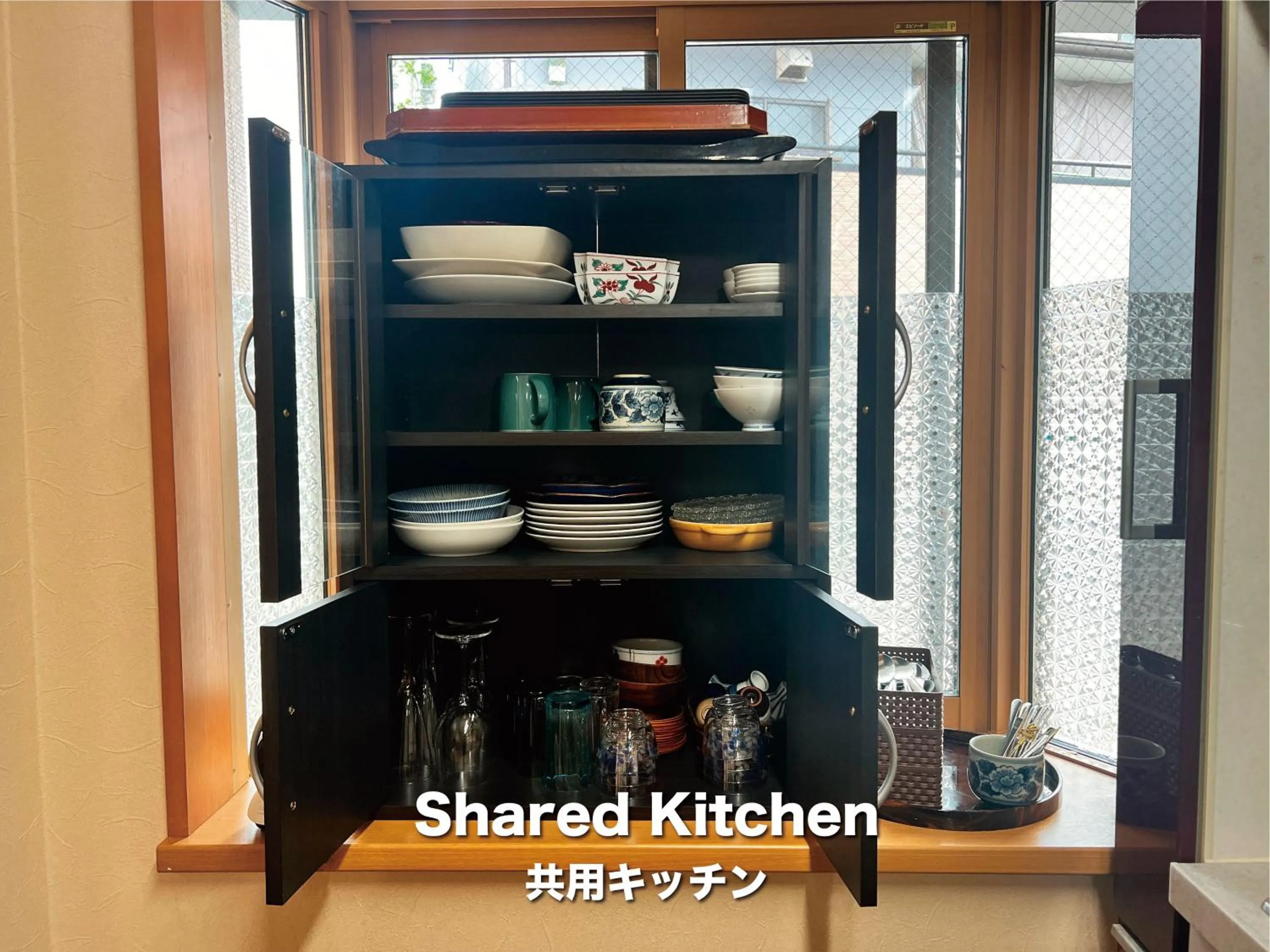 Communal kitchen in Jinya Sunset Inn by Murasaki