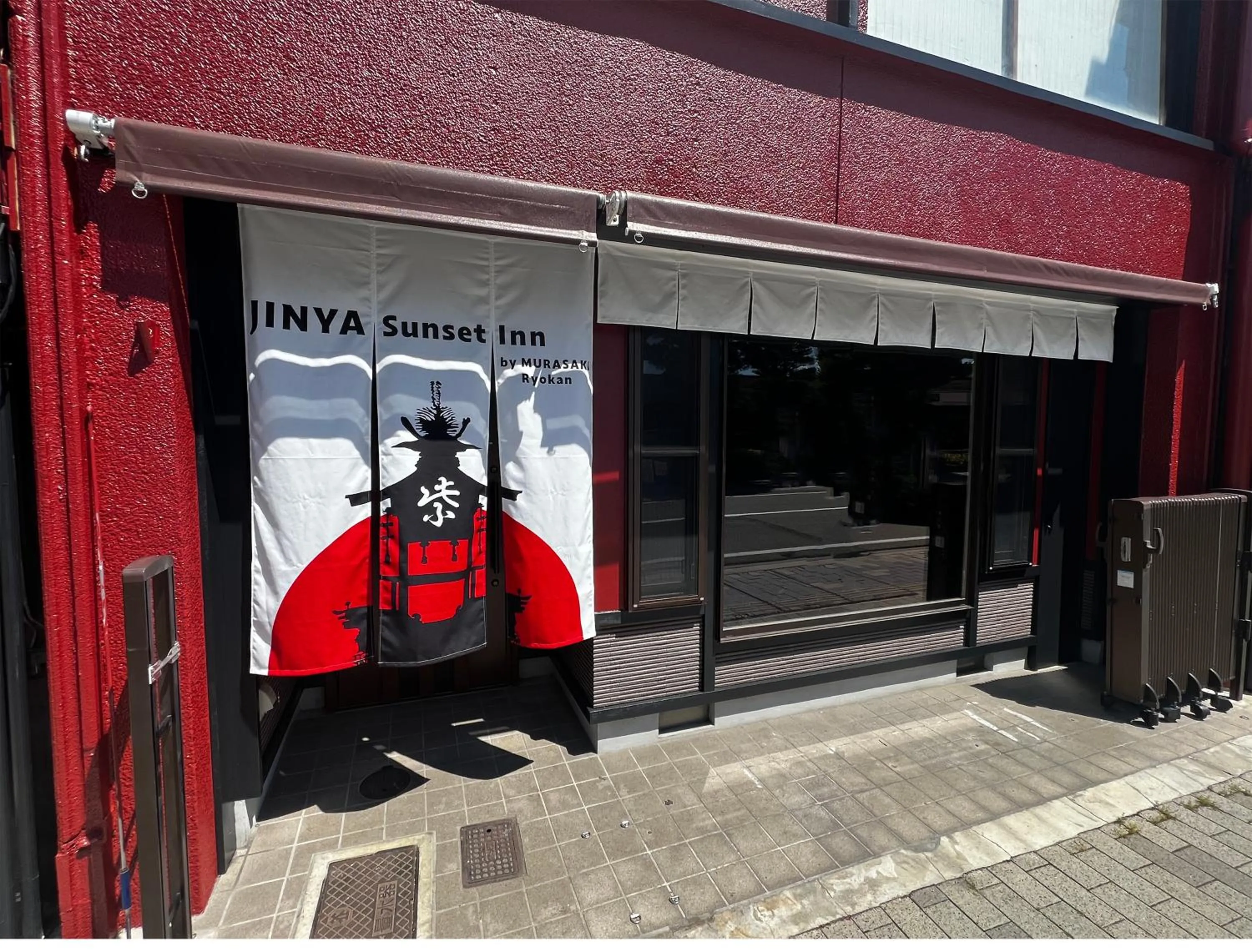 Property building in Jinya Sunset Inn by Murasaki