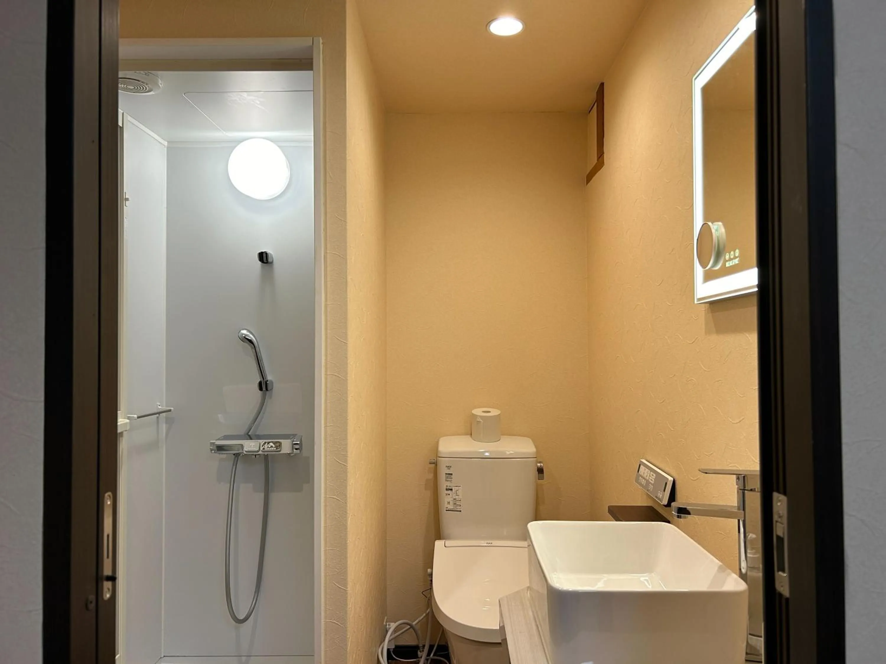 Shower in Jinya Sunset Inn by Murasaki