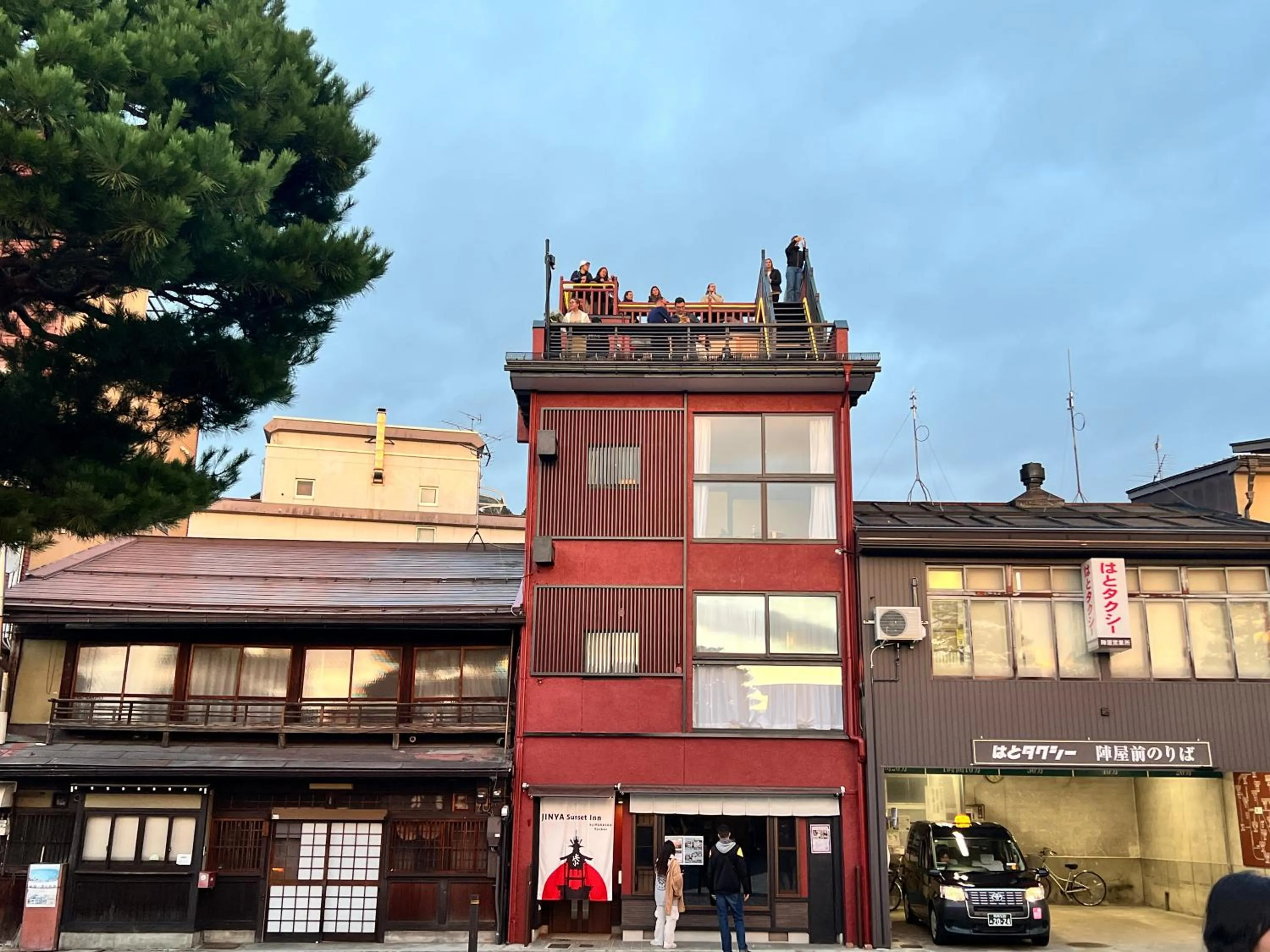 Property building in Jinya Sunset Inn by Murasaki