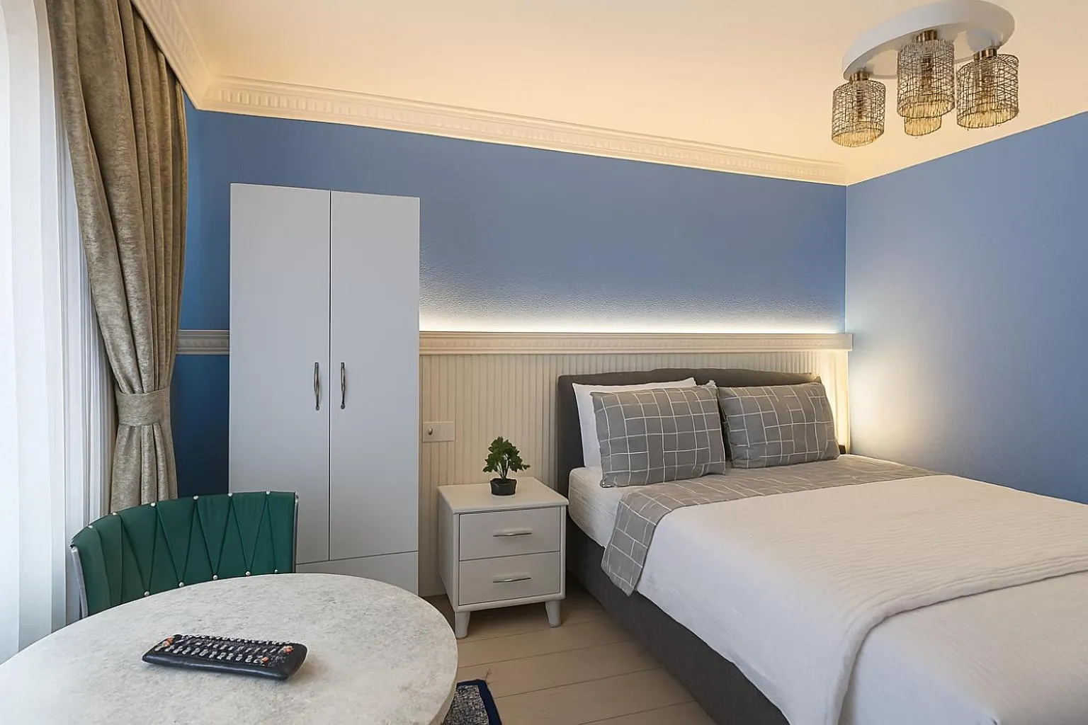 Bed in Ozer Hotel & Apartments