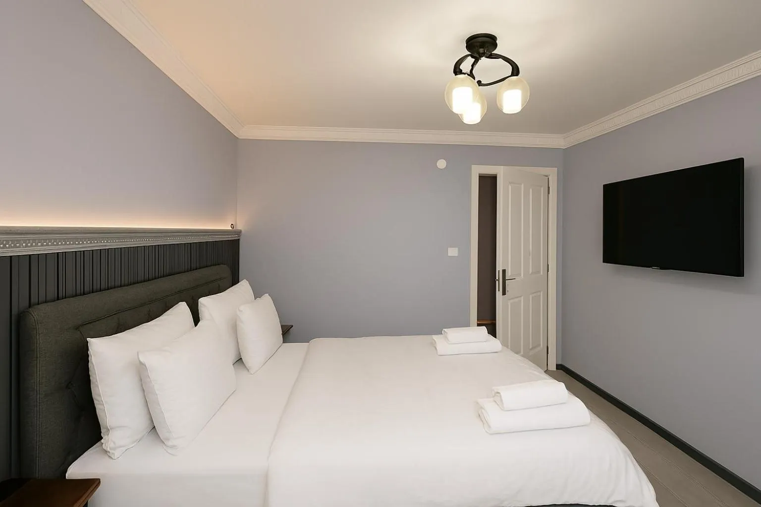 Bed in Ozer Hotel & Apartments