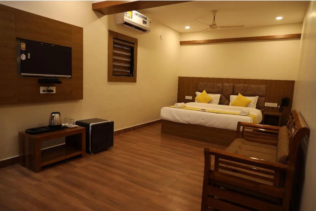 Photo of the whole room, Bed in Hotel president park Coimbatore