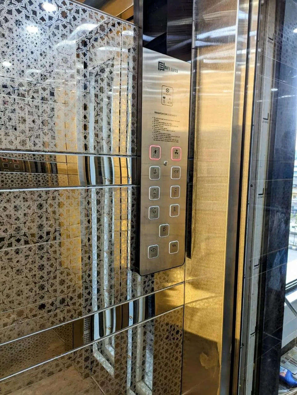 elevator in Hotel Majestic By NxtJen Hospitality