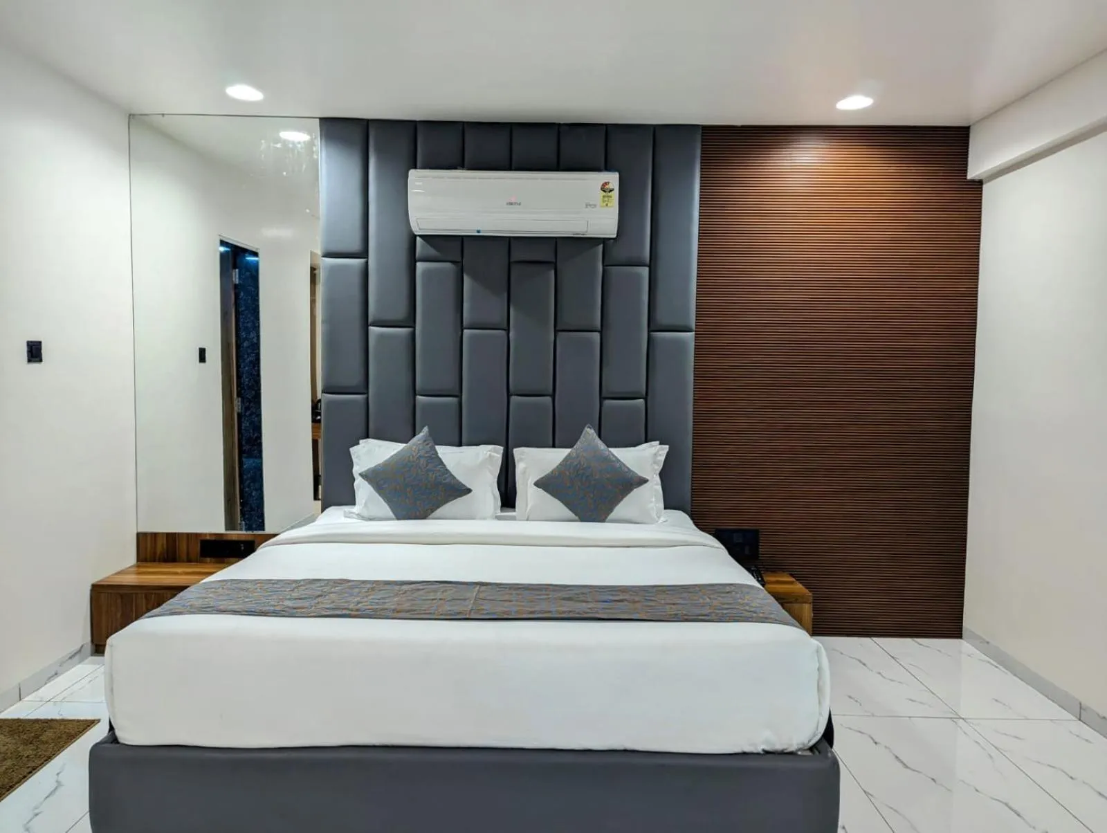 Bed in Hotel Majestic By NxtJen Hospitality