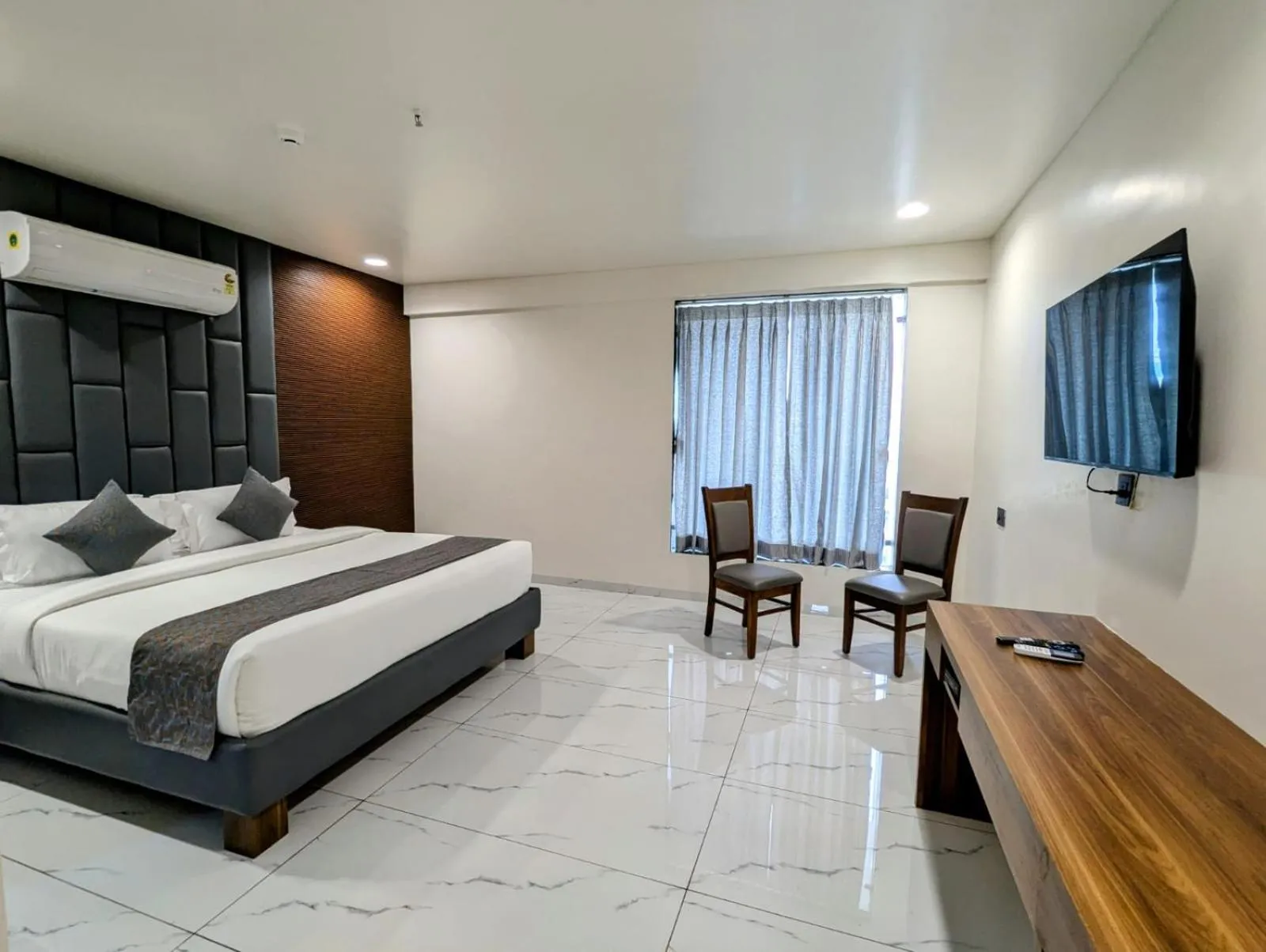 Bed in Hotel Majestic By NxtJen Hospitality