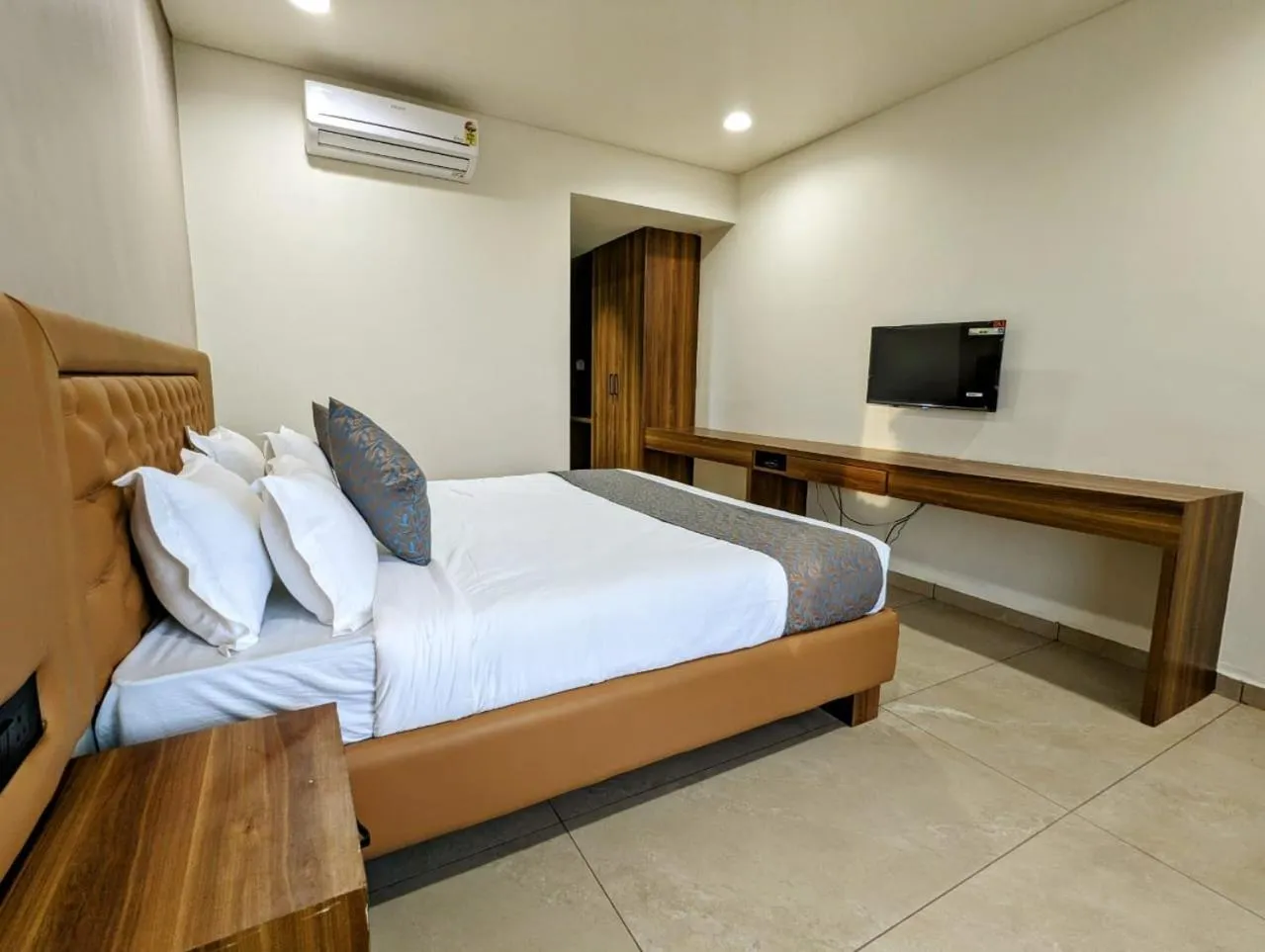 Bed in Hotel Majestic By NxtJen Hospitality