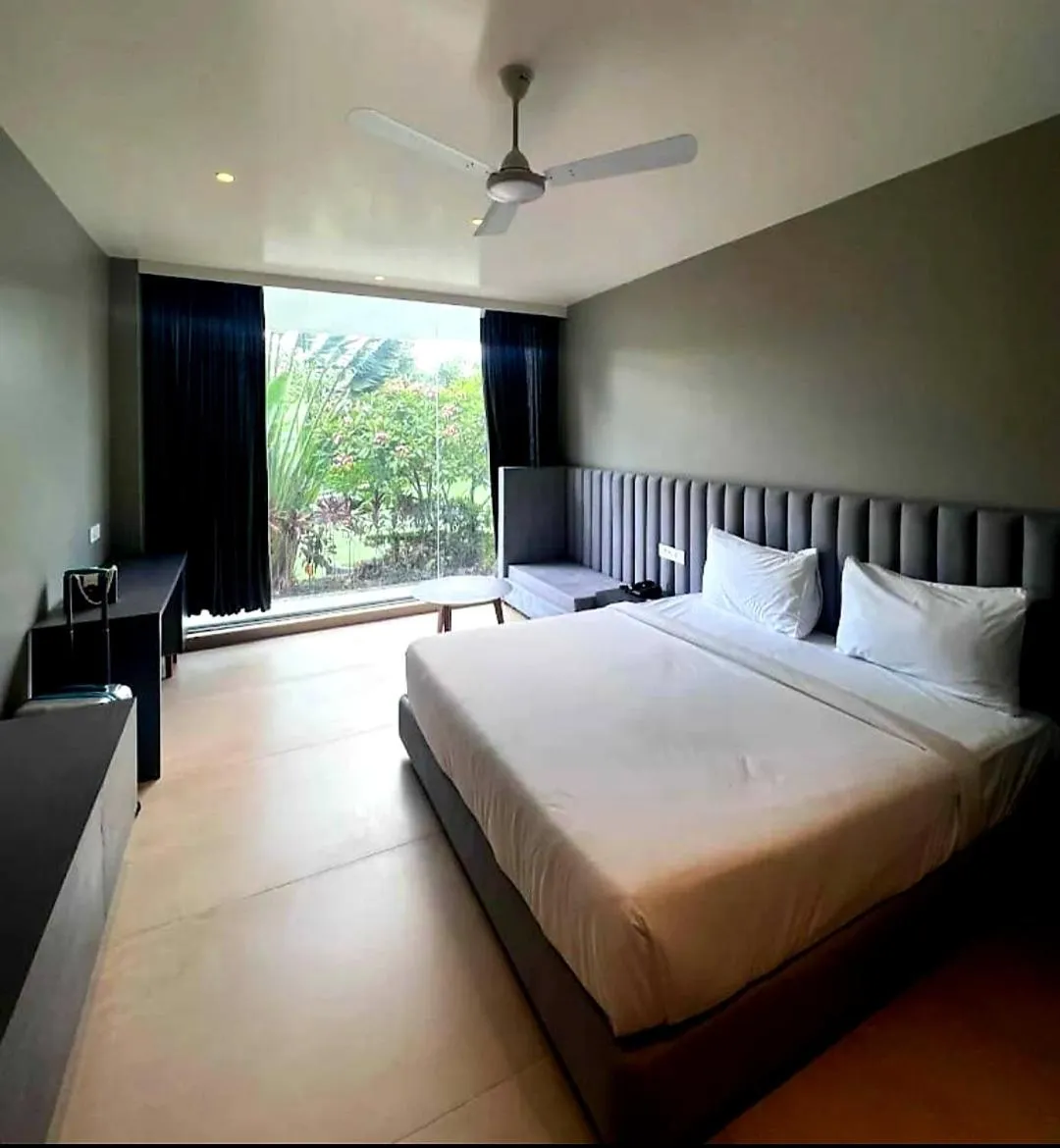 Bed in The Democracy Hotel & Resorts