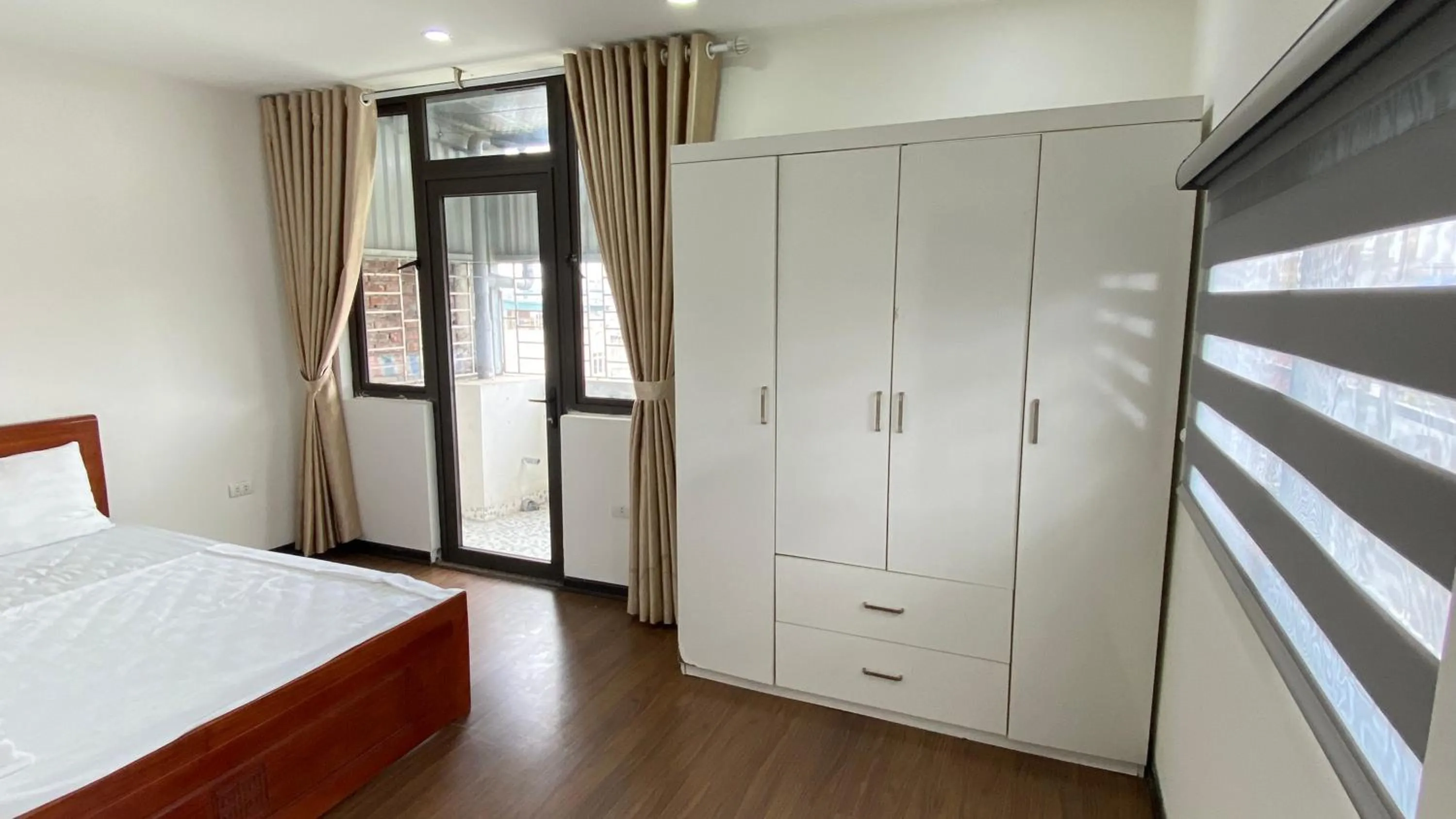 Bed in Era Apartment La Thành