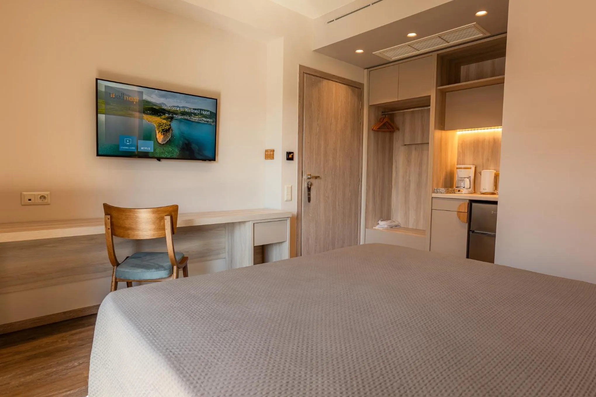 Bed in Wellnest Hotel