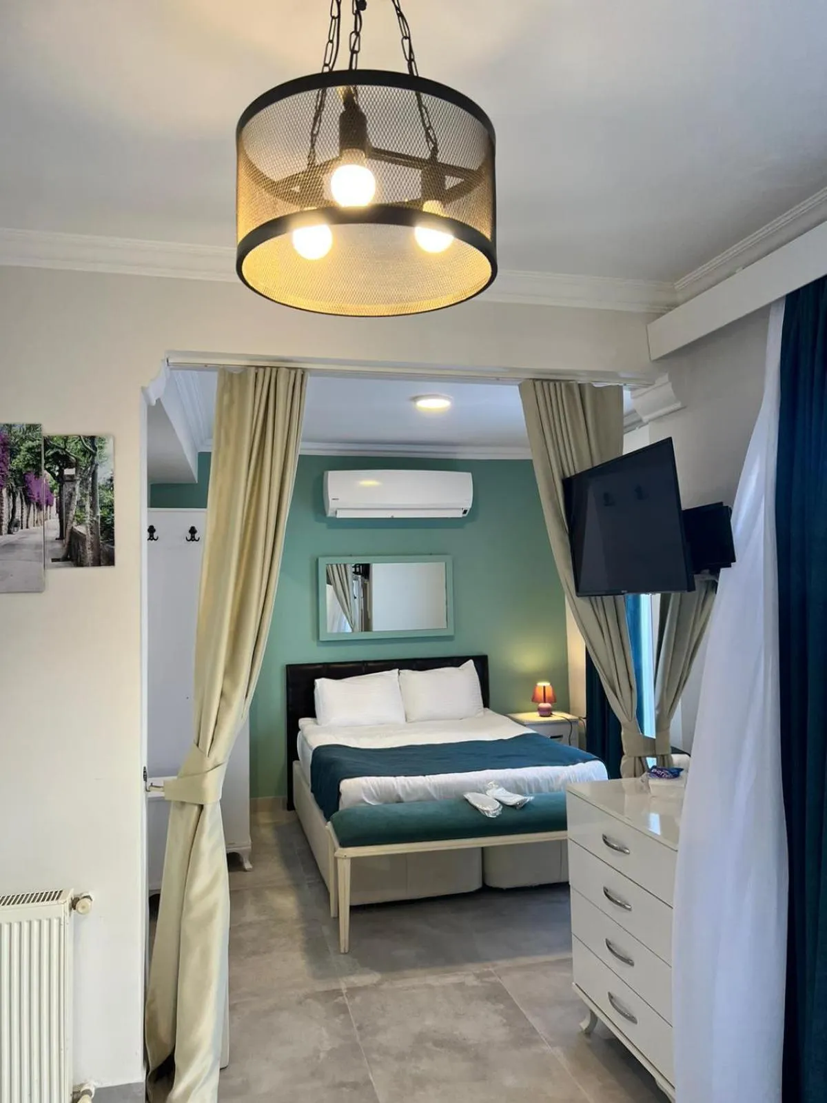 Bed in Mia Hill Suites