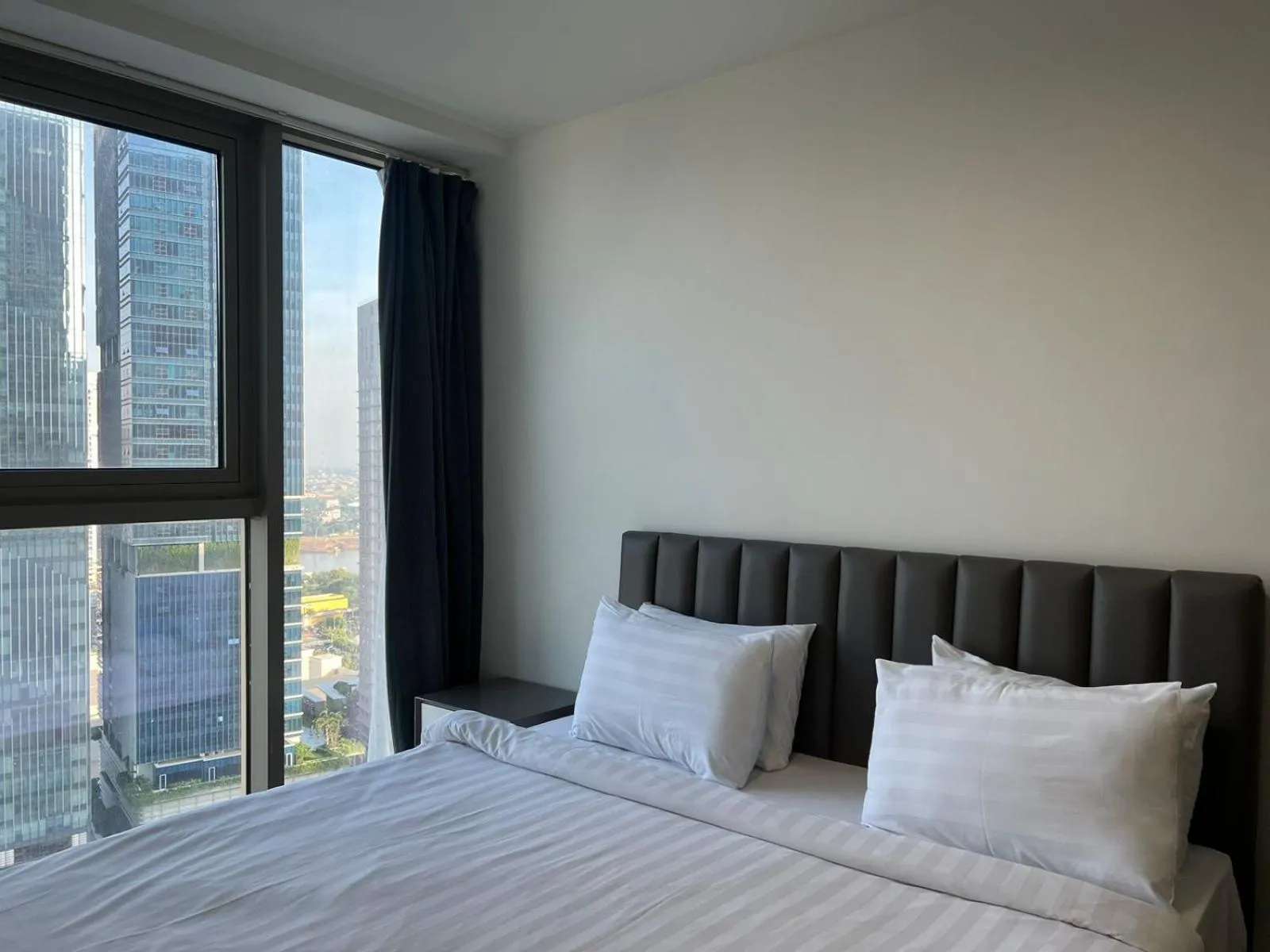 Bed in The PeAk Residence, Multi-Apartment by Emma