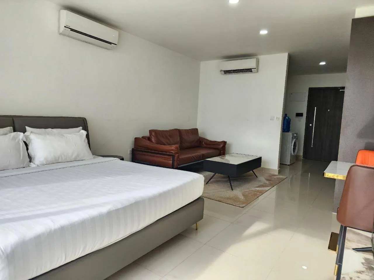 Bed in The PeAk Residence, Multi-Apartment by Emma