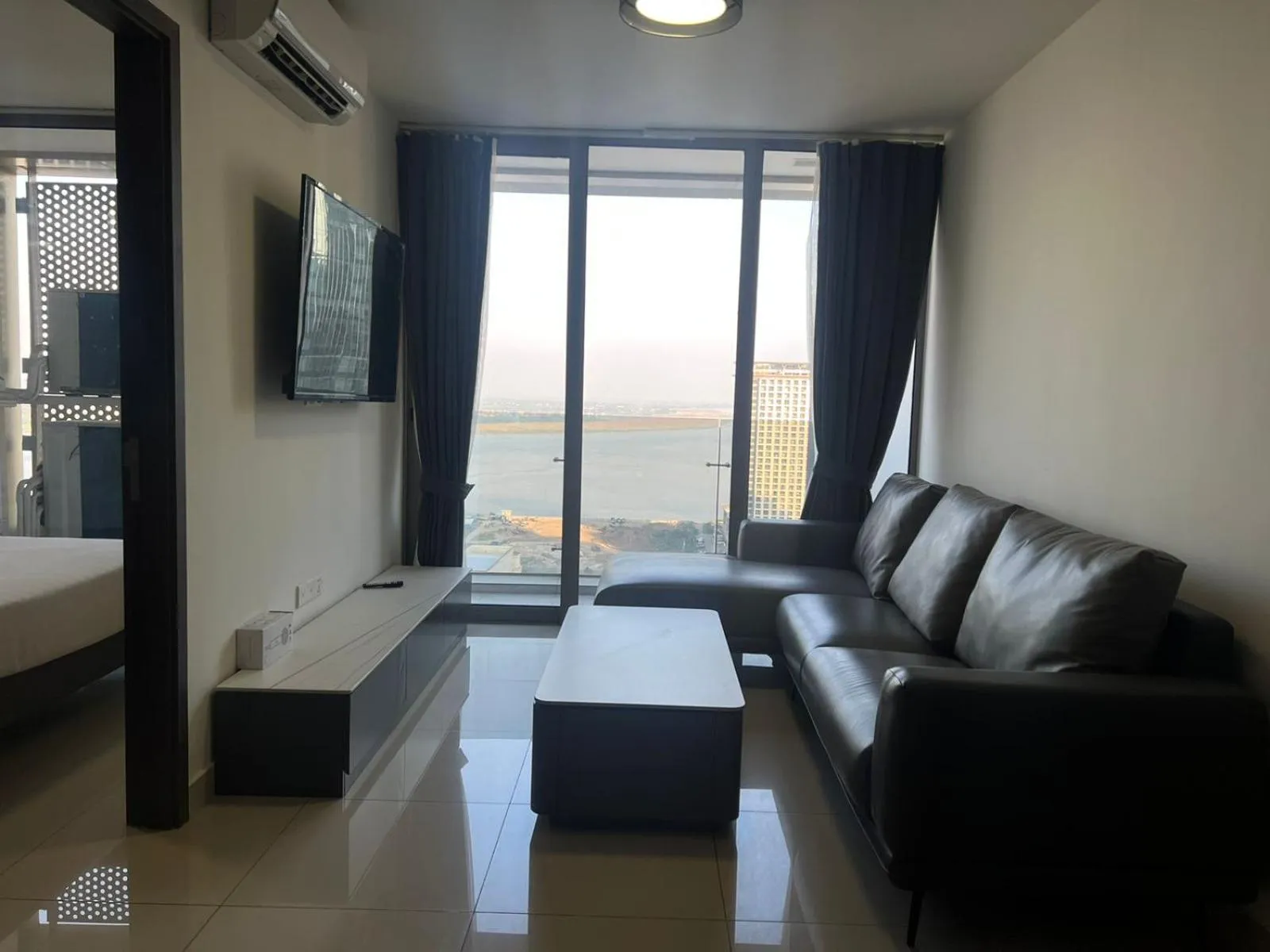 Bed in The PeAk Residence, Multi-Apartment by Emma