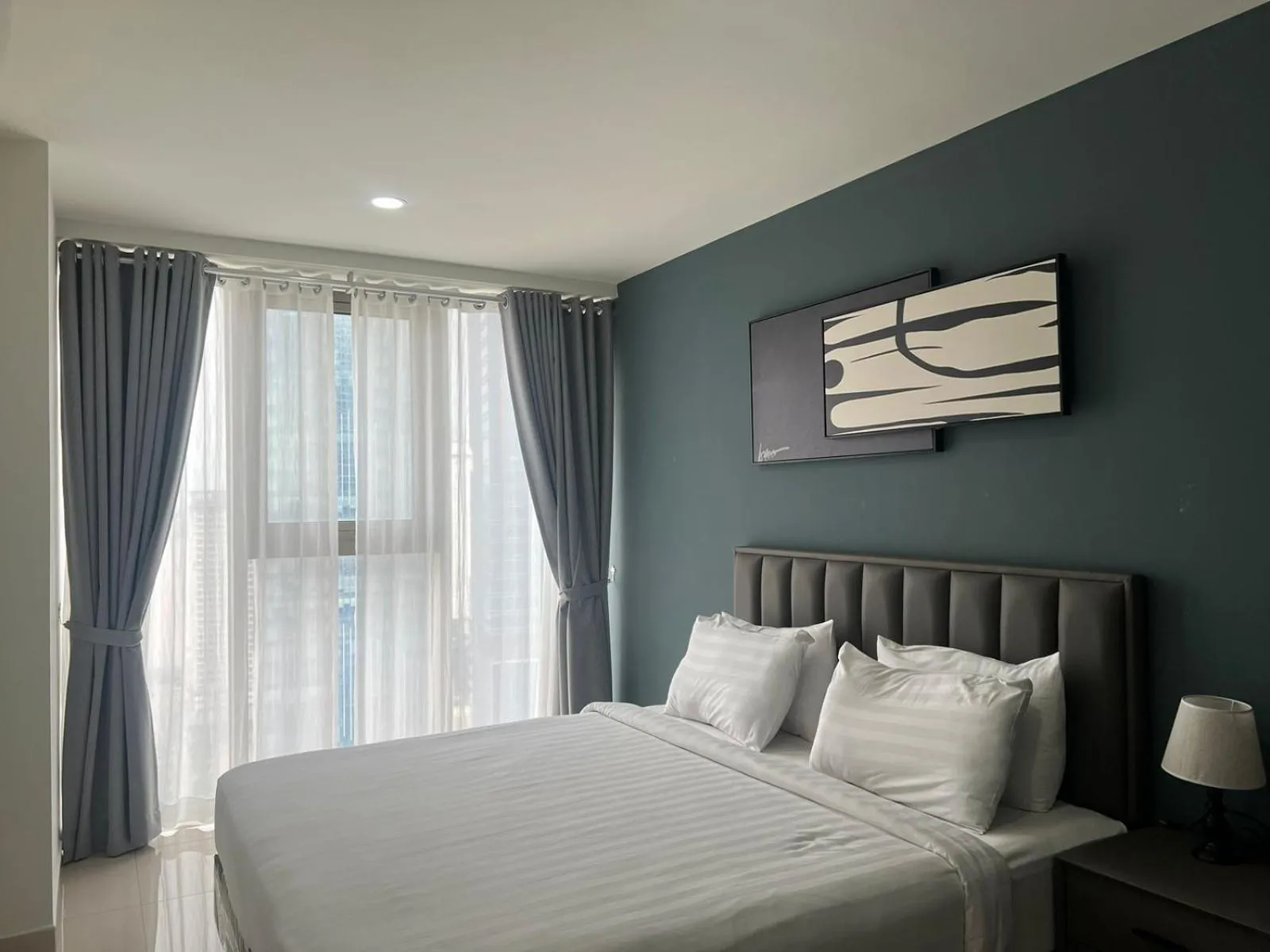 Bed in The PeAk Residence, Multi-Apartment by Emma