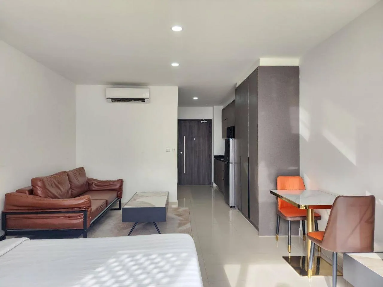 Bed in The PeAk Residence, Multi-Apartment by Emma