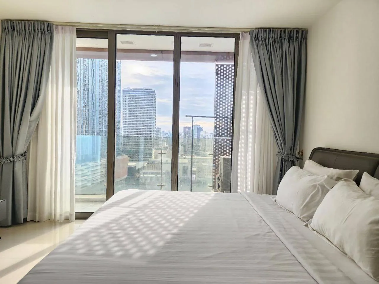 Bed in The PeAk Residence, Multi-Apartment by Emma