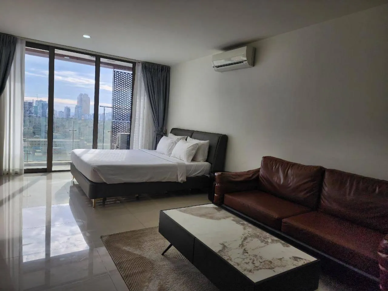 Bed in The PeAk Residence, Multi-Apartment by Emma