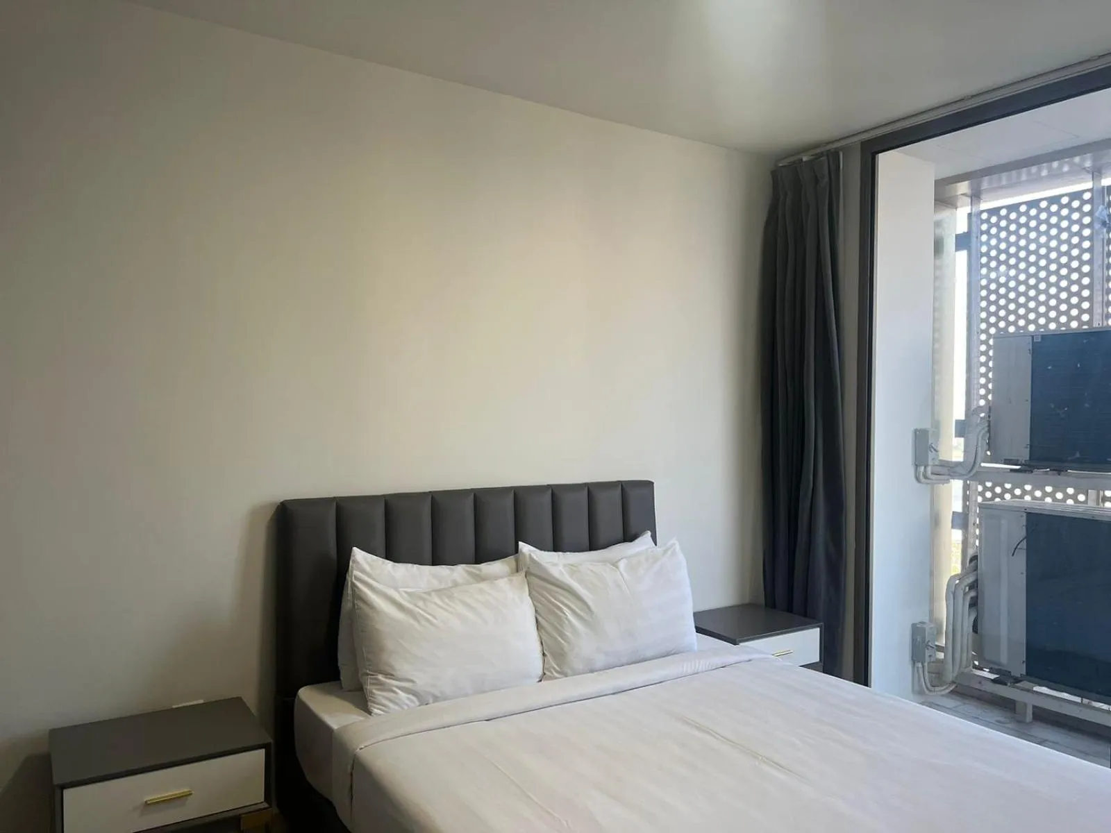 Bed in The PeAk Residence, Multi-Apartment by Emma