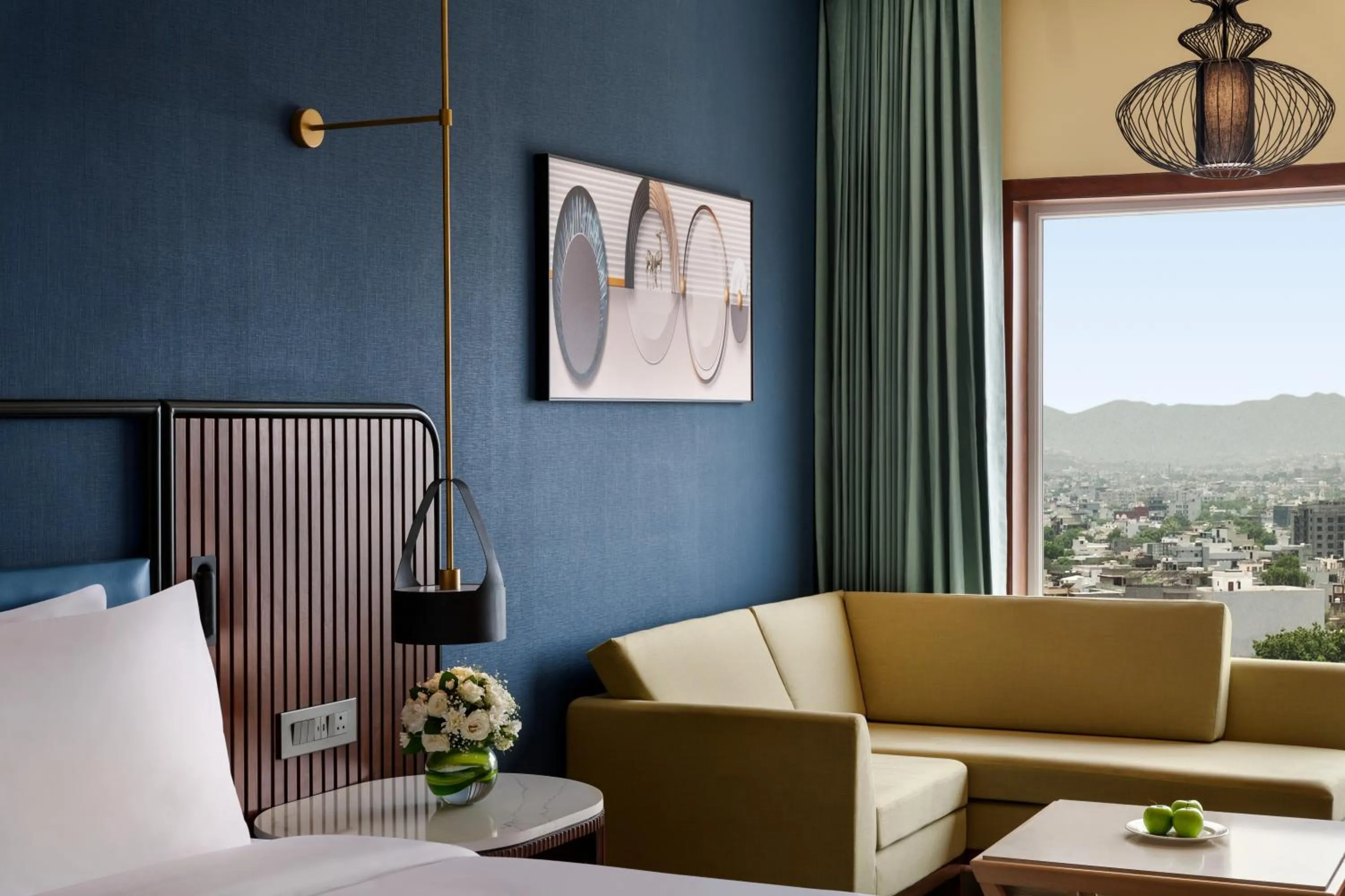 Seating area in Ramada Encore by Wyndham Udaipur Roopnagar