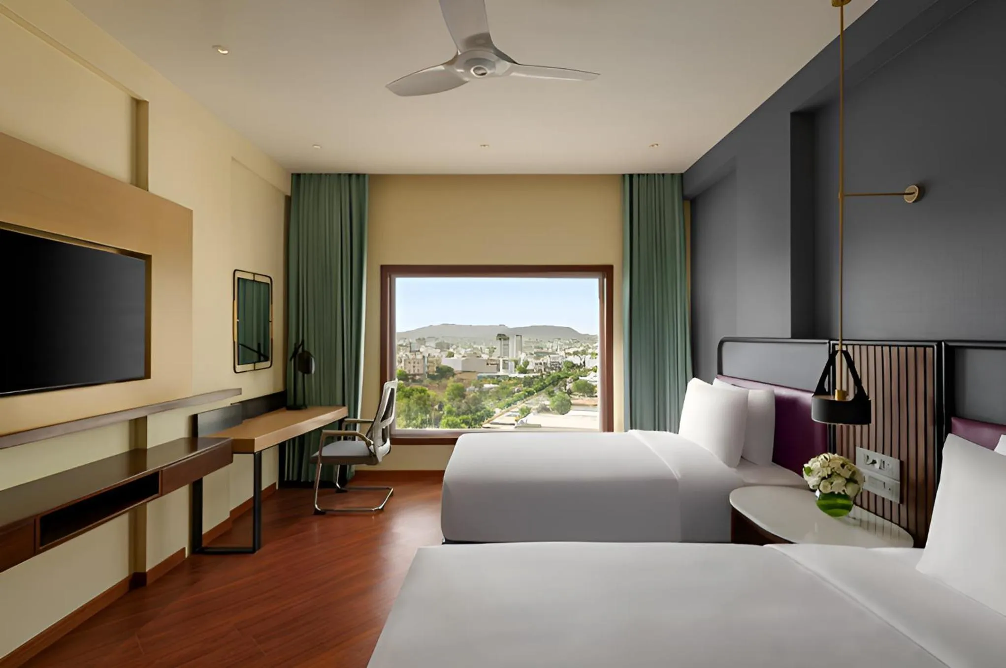 Bed in Ramada Encore by Wyndham Udaipur Roopnagar