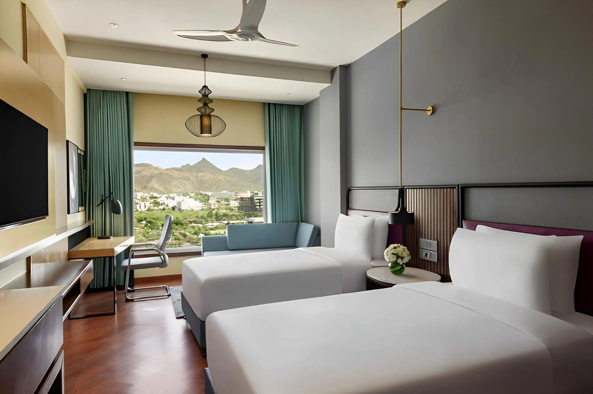 Bed in Ramada Encore by Wyndham Udaipur Roopnagar