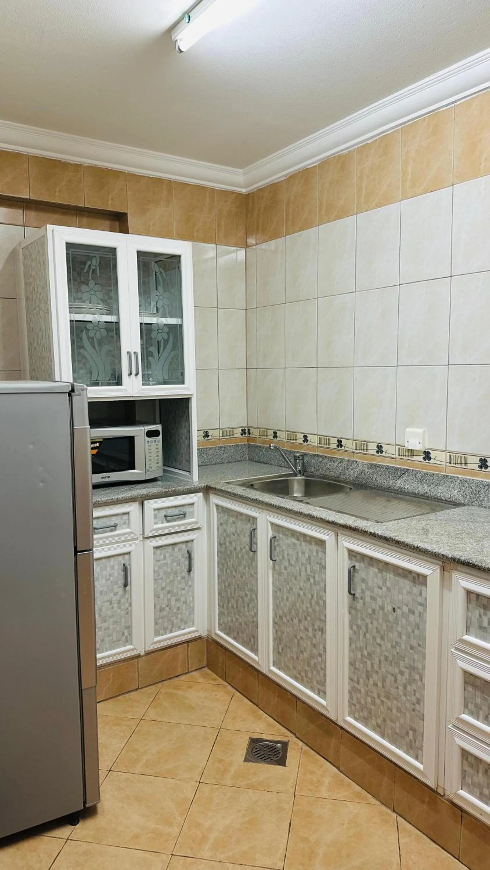 Kitchen or kitchenette in Dahlia Sohar Hotel Apartments