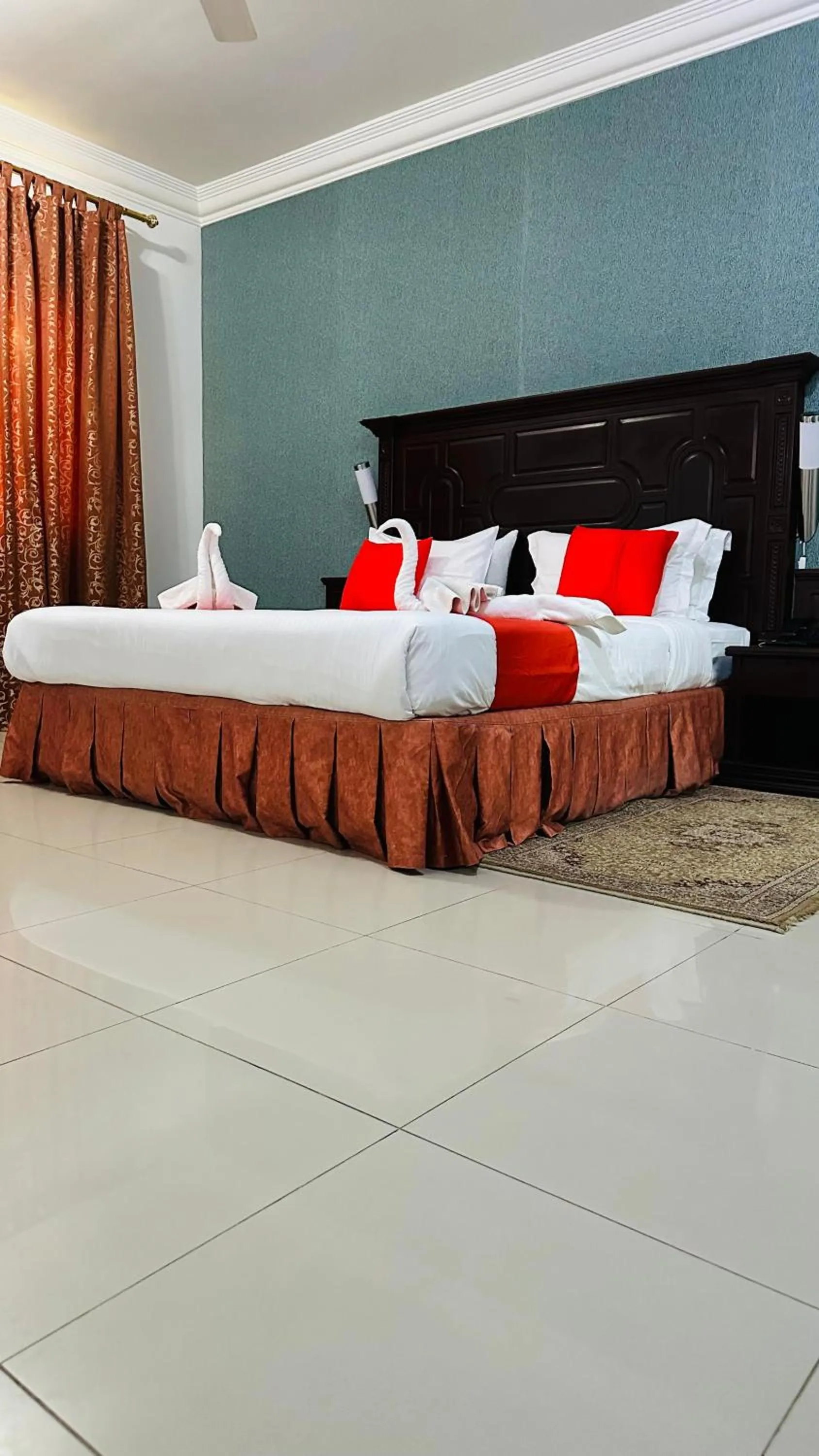 Bed in Dahlia Sohar Hotel Apartments