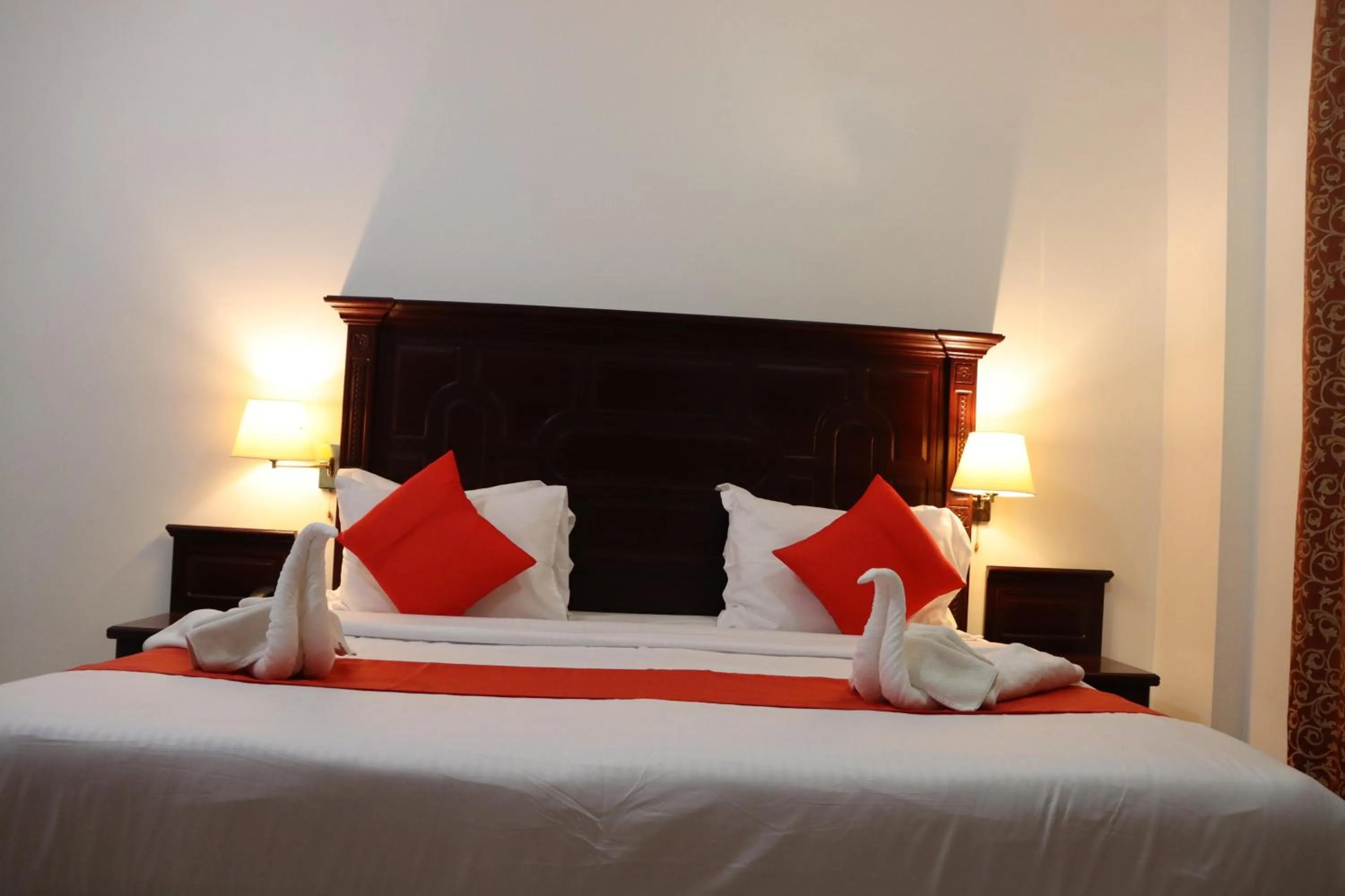 Bed in Dahlia Sohar Hotel Apartments