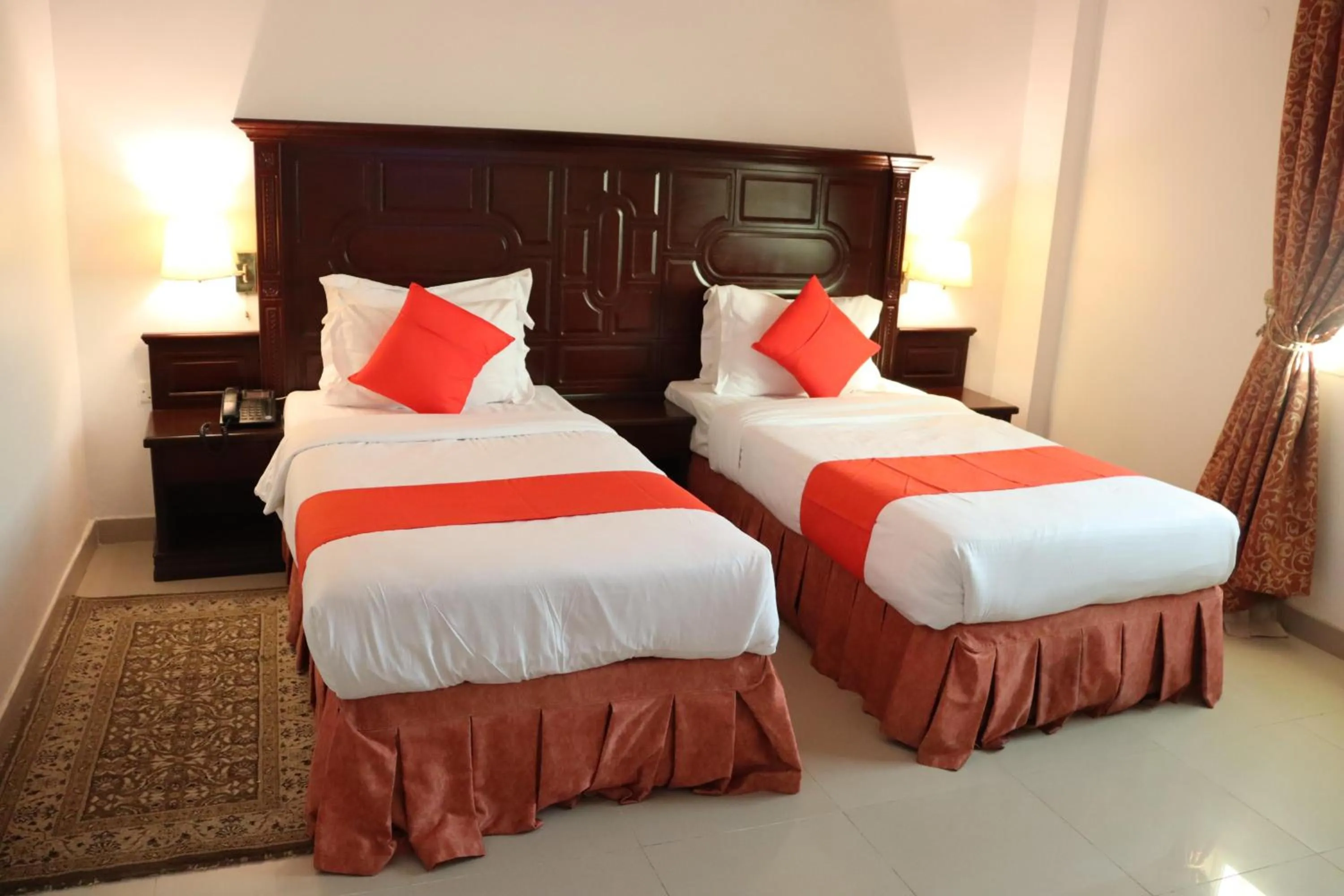 Bed in Dahlia Sohar Hotel Apartments